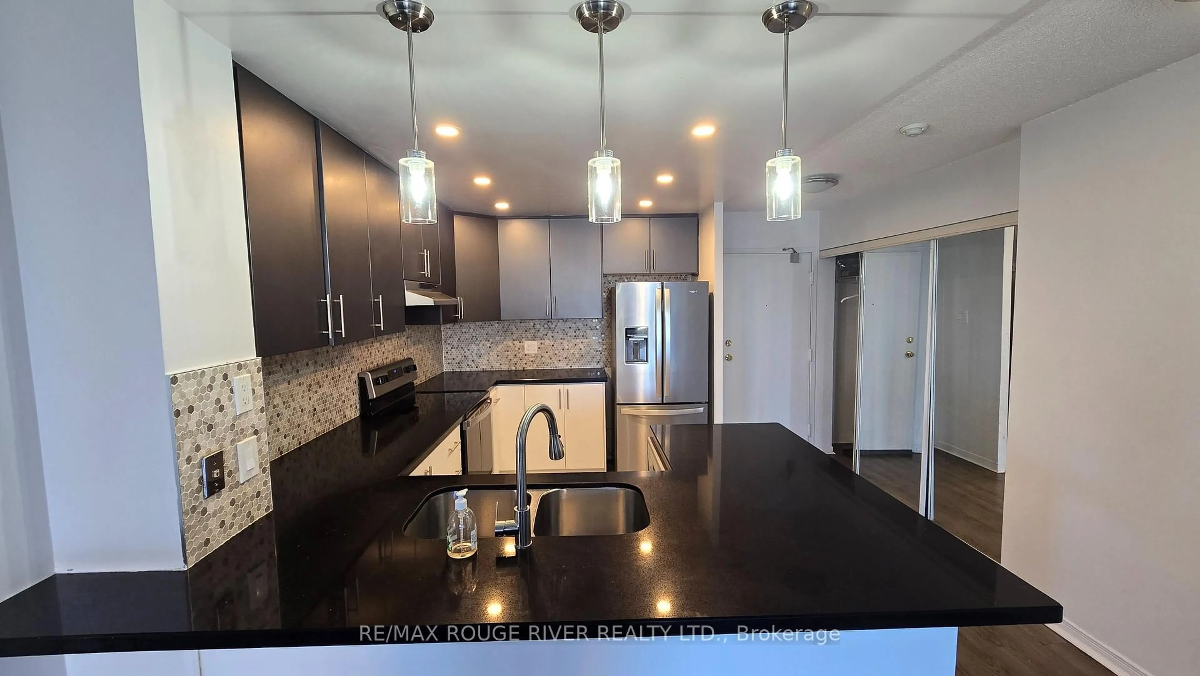 Open concept kitchen, unknown for 8 Silver Bell Grve #309, Toronto Ontario M1B 4Z3
