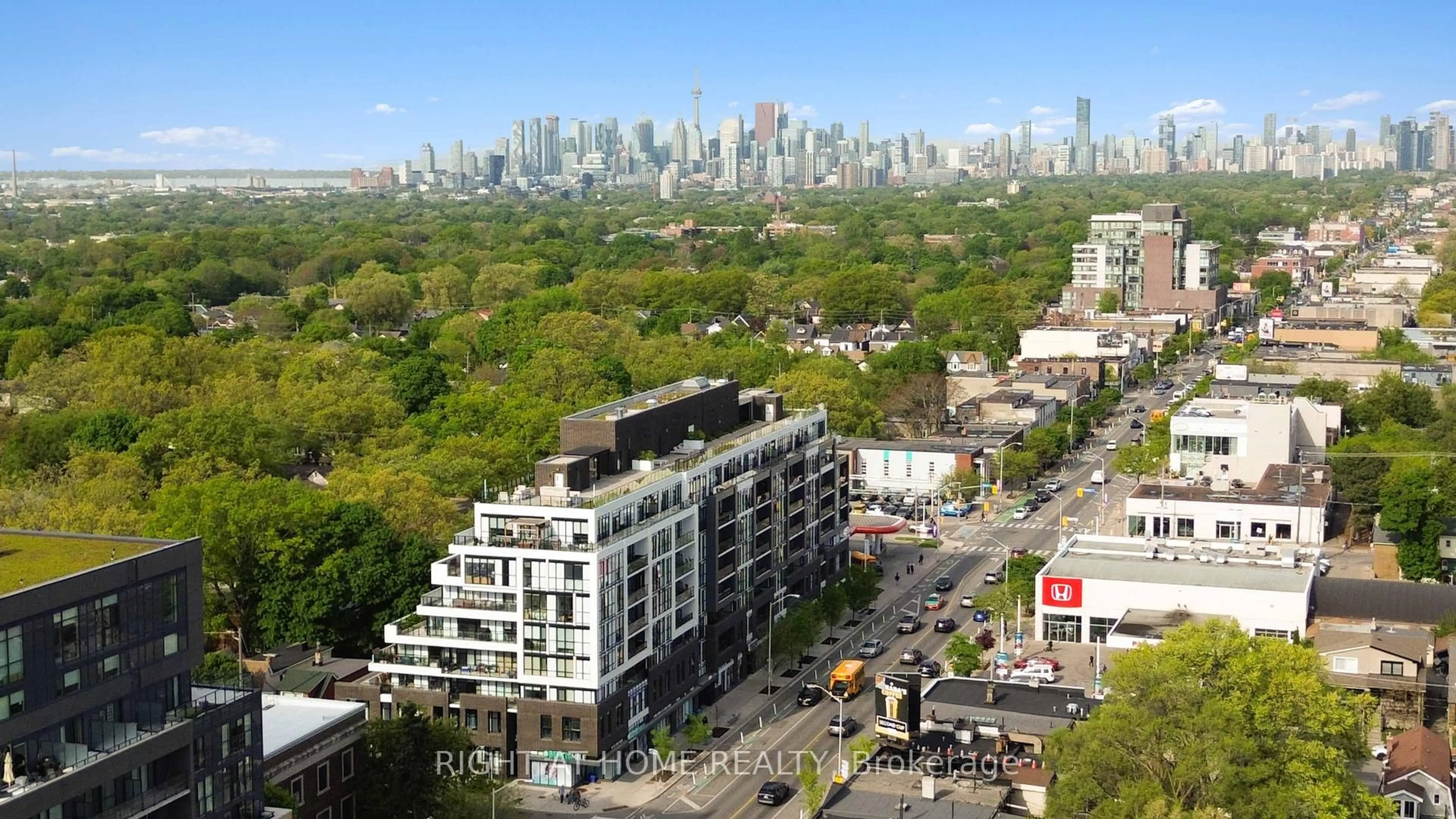 A pic from outside/outdoor area/front of a property/back of a property/a pic from drone, city buildings view from balcony for 2301 Danforth Ave #PH801, Toronto Ontario M4C 0A7