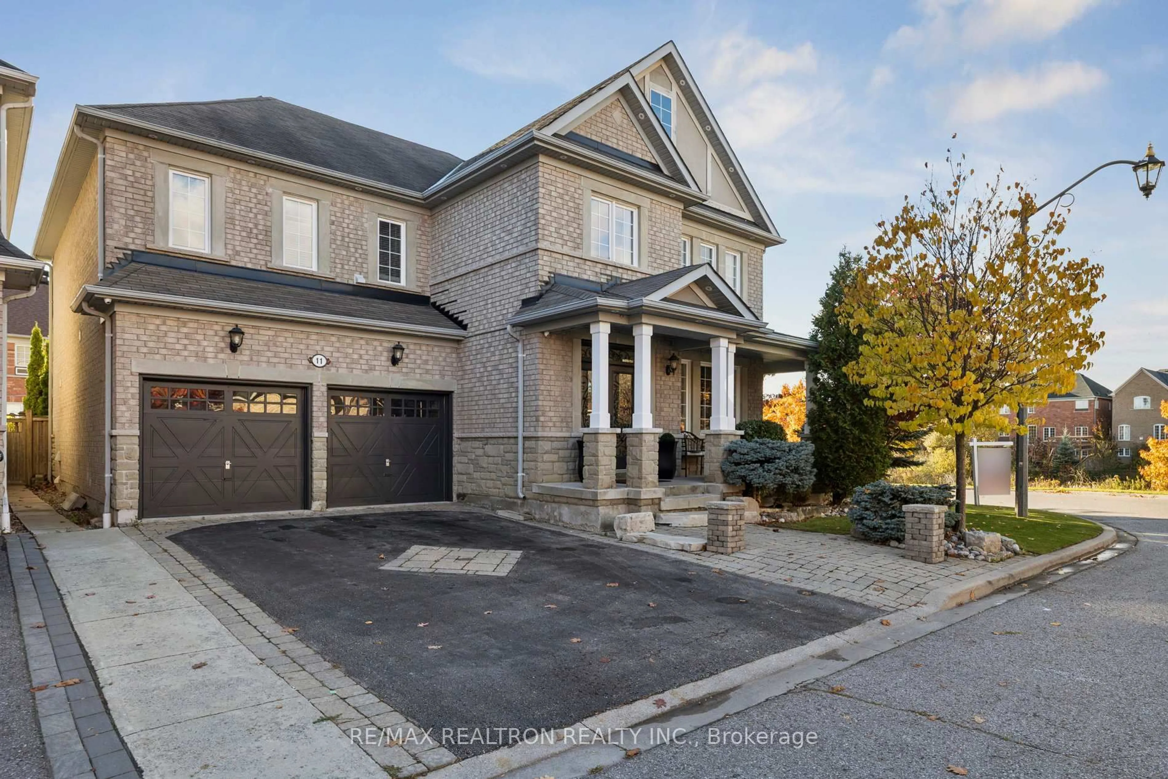 Home with brick exterior material, street for 11 Shorten Pl, Ajax Ontario L1T 0E9