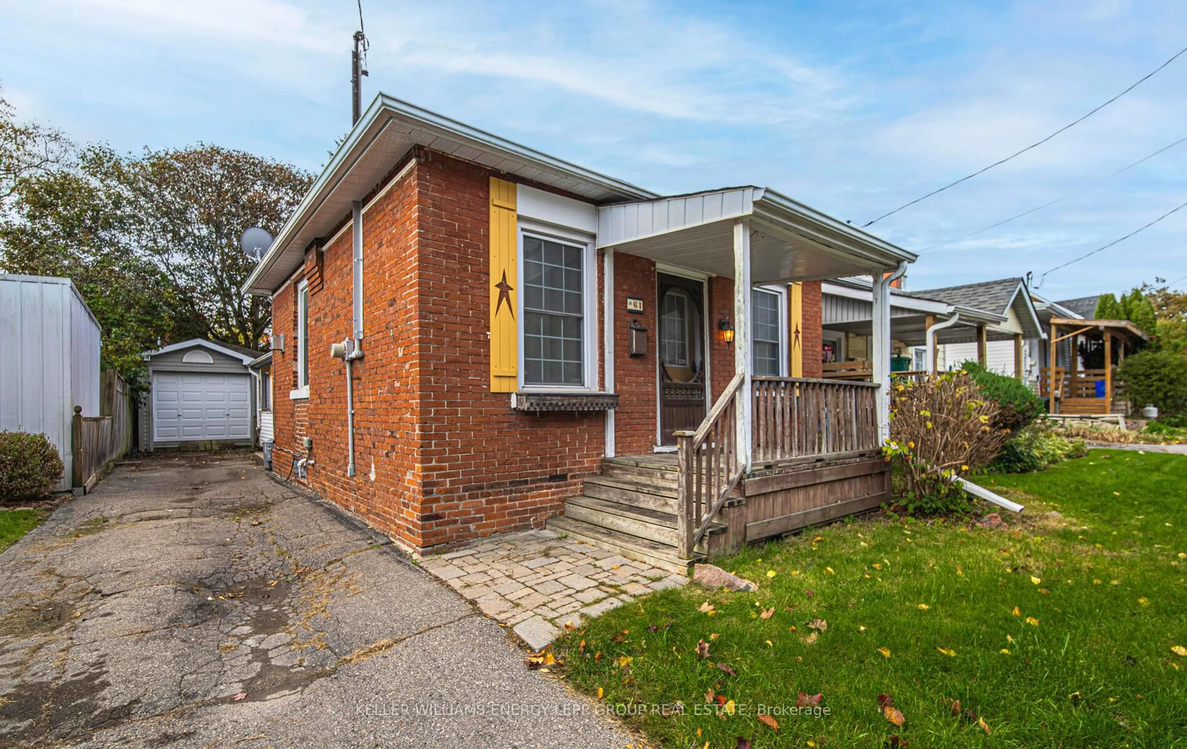 Home with brick exterior material, street for 61 Wellington St, Clarington Ontario L1C 1V6