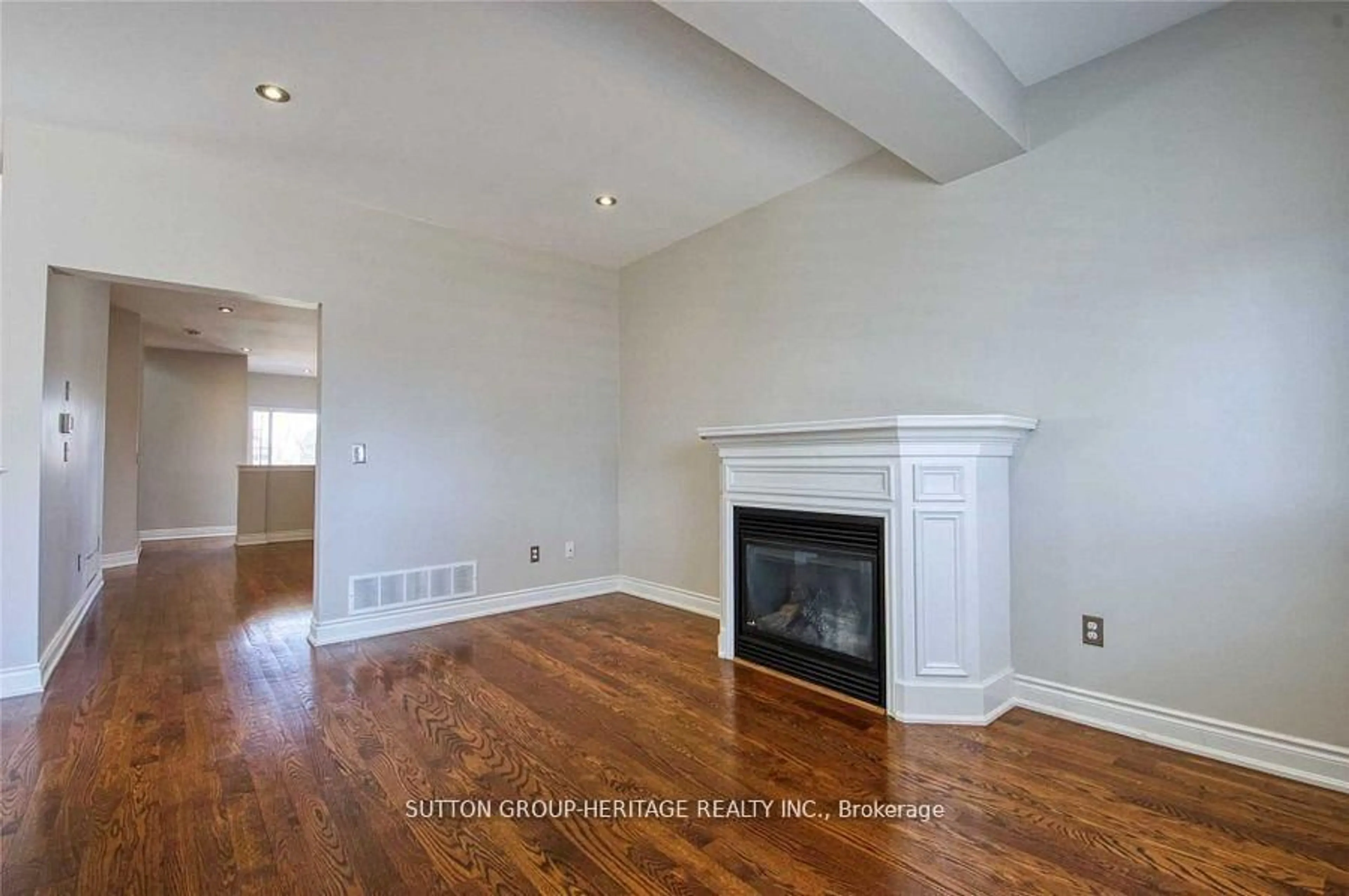 Living room with furniture, wood/laminate floor for 52 Wessex Dr, Whitby Ontario L1M 2C3