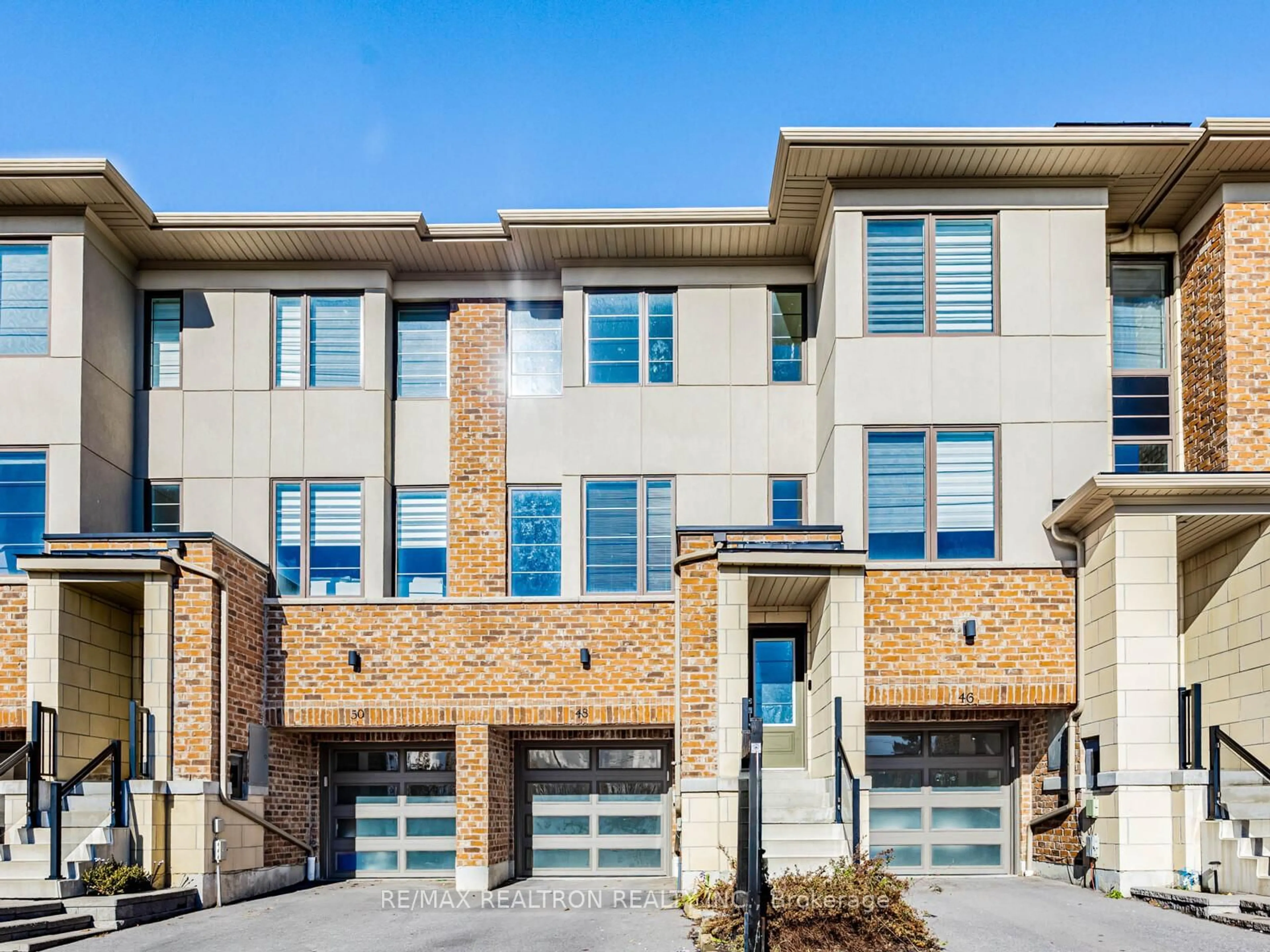 Home with brick exterior material, street for 48 Shawfield Way, Whitby Ontario L1R 0N8