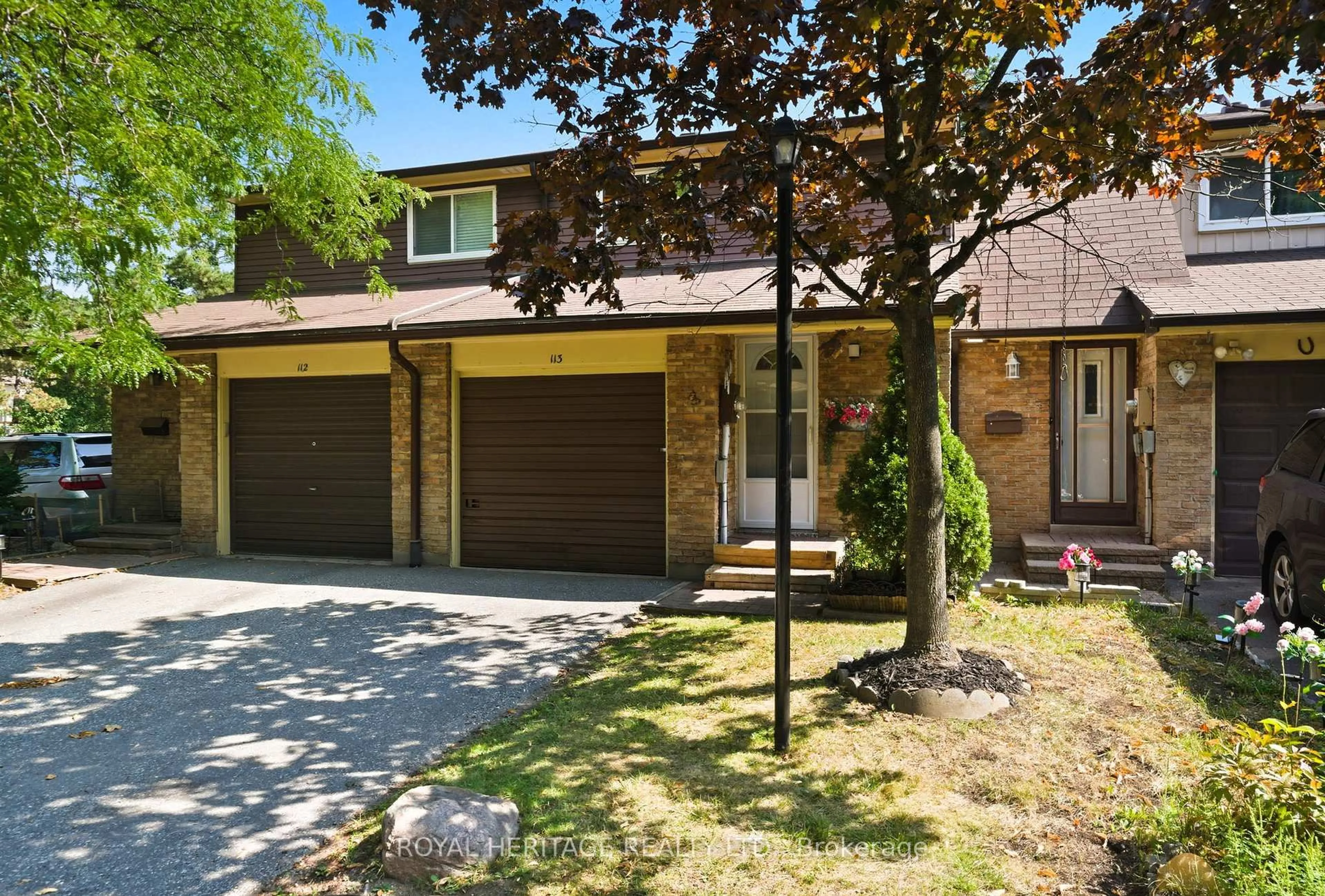 Home with brick exterior material, street for 929 Burns St #113, Whitby Ontario L1N 6J5