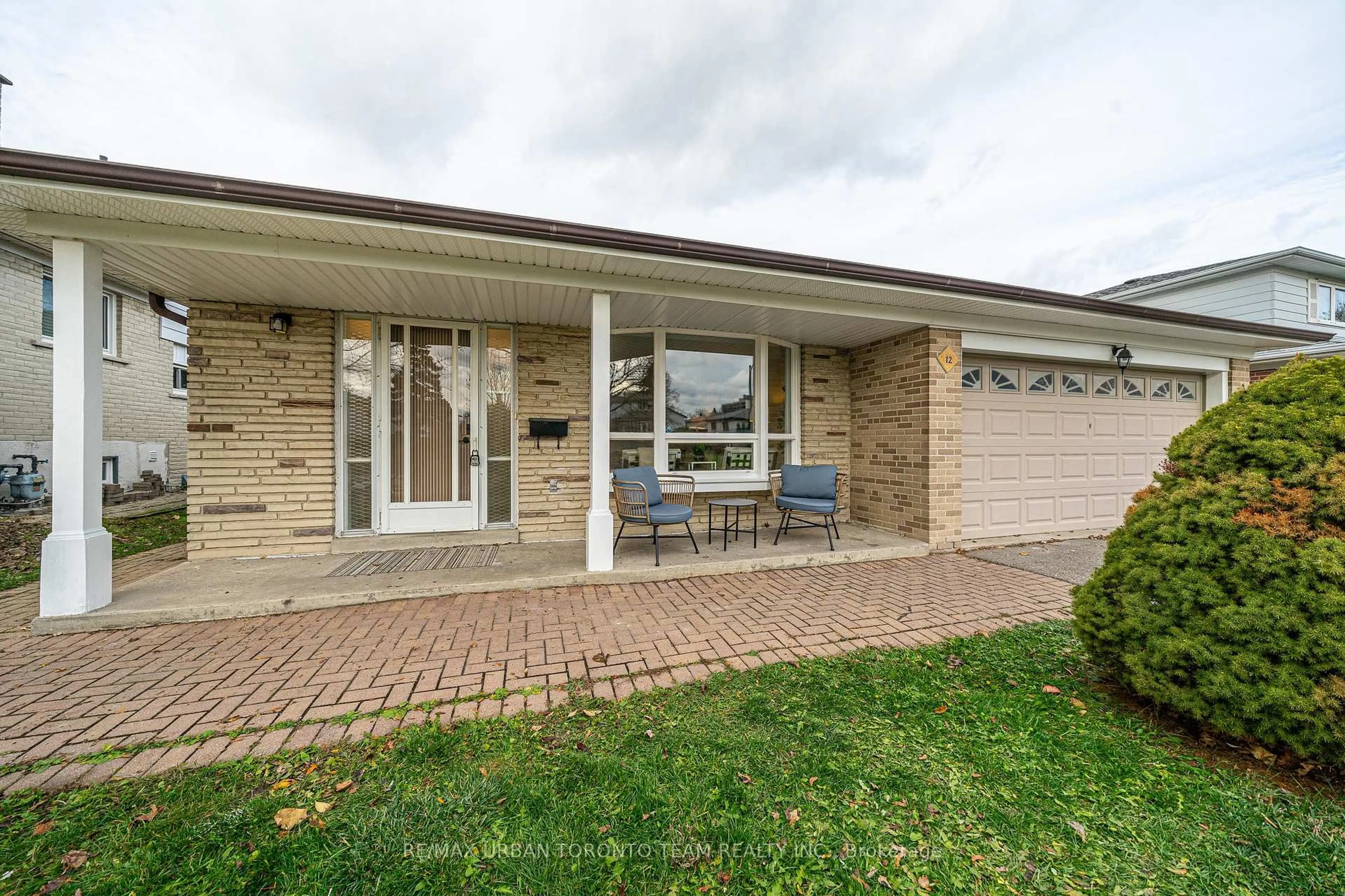 Home with brick exterior material, street for 12 Wardencourt Dr, Toronto Ontario M1T 2H3