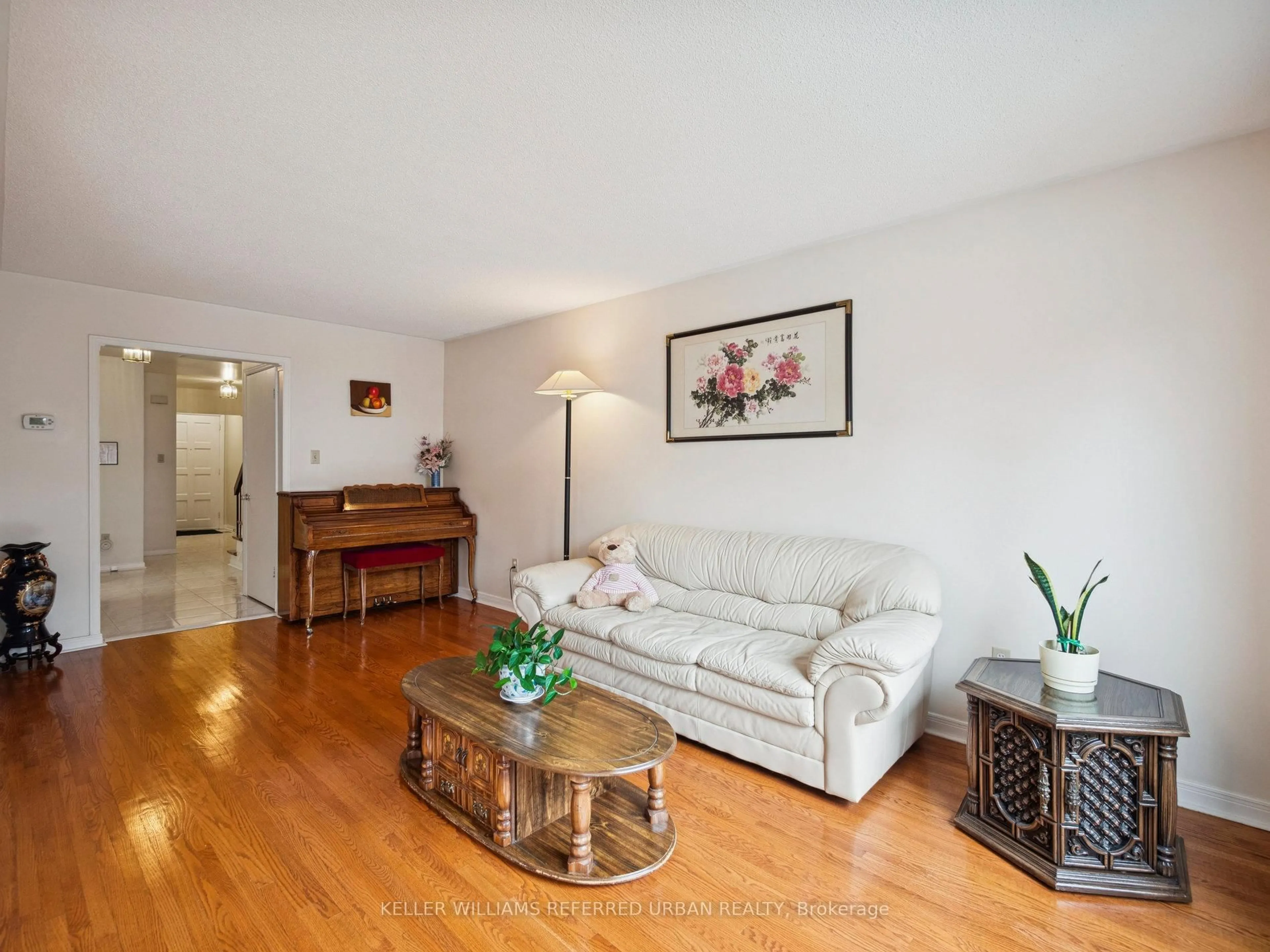 Living room with furniture, wood/laminate floor for 339 Chartland Blvd, Toronto Ontario M1S 3P4