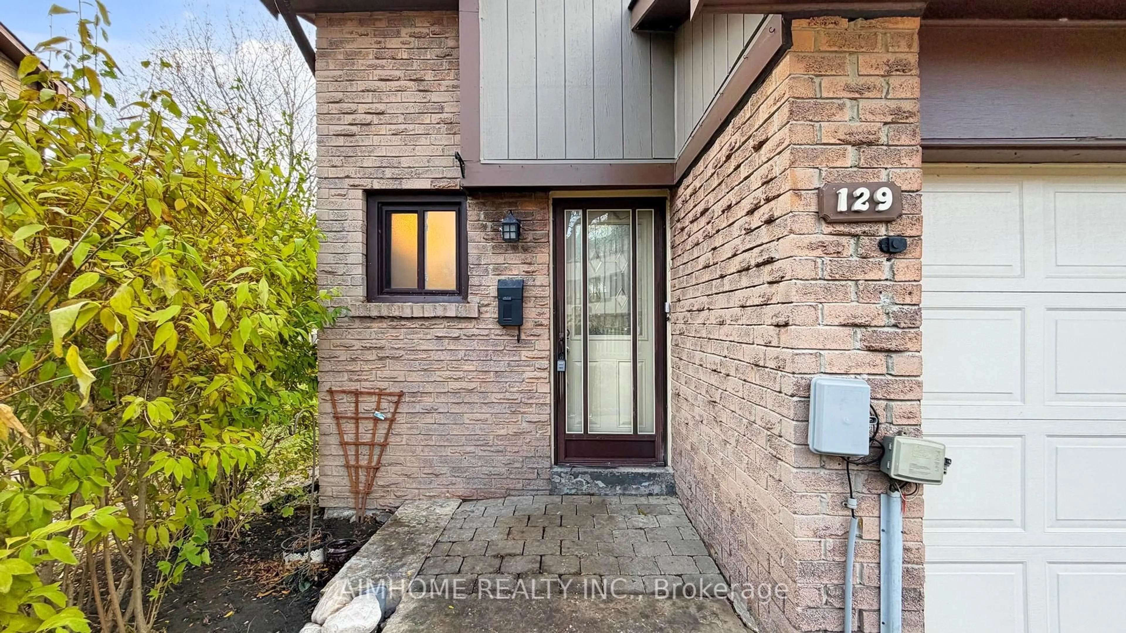 Home with brick exterior material, street for 24 Fundy Bay Blvd #129, Toronto Ontario M1W 3A4