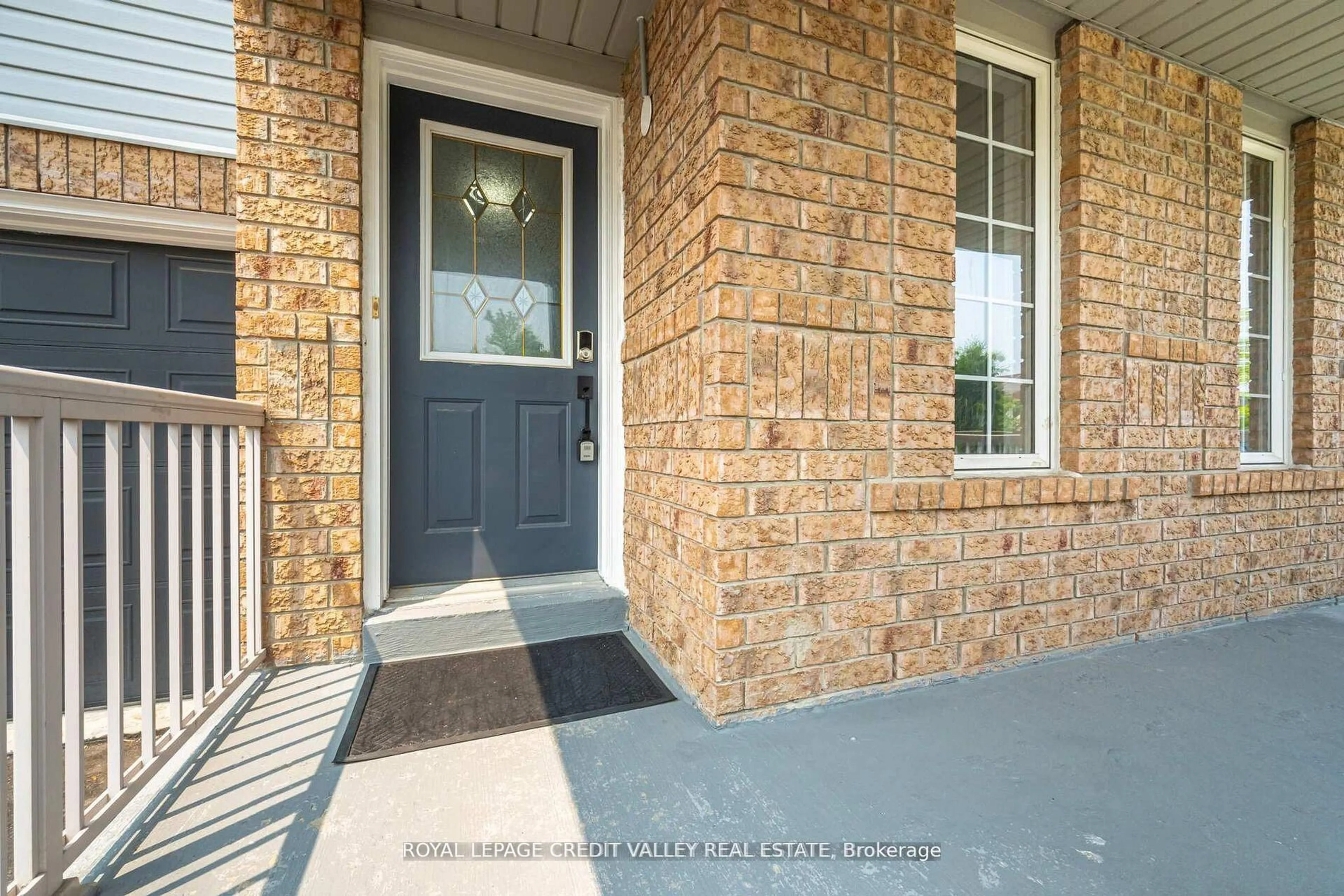 Home with brick exterior material, street for 12 Greenhalf Dr, Ajax Ontario L1S 7N6