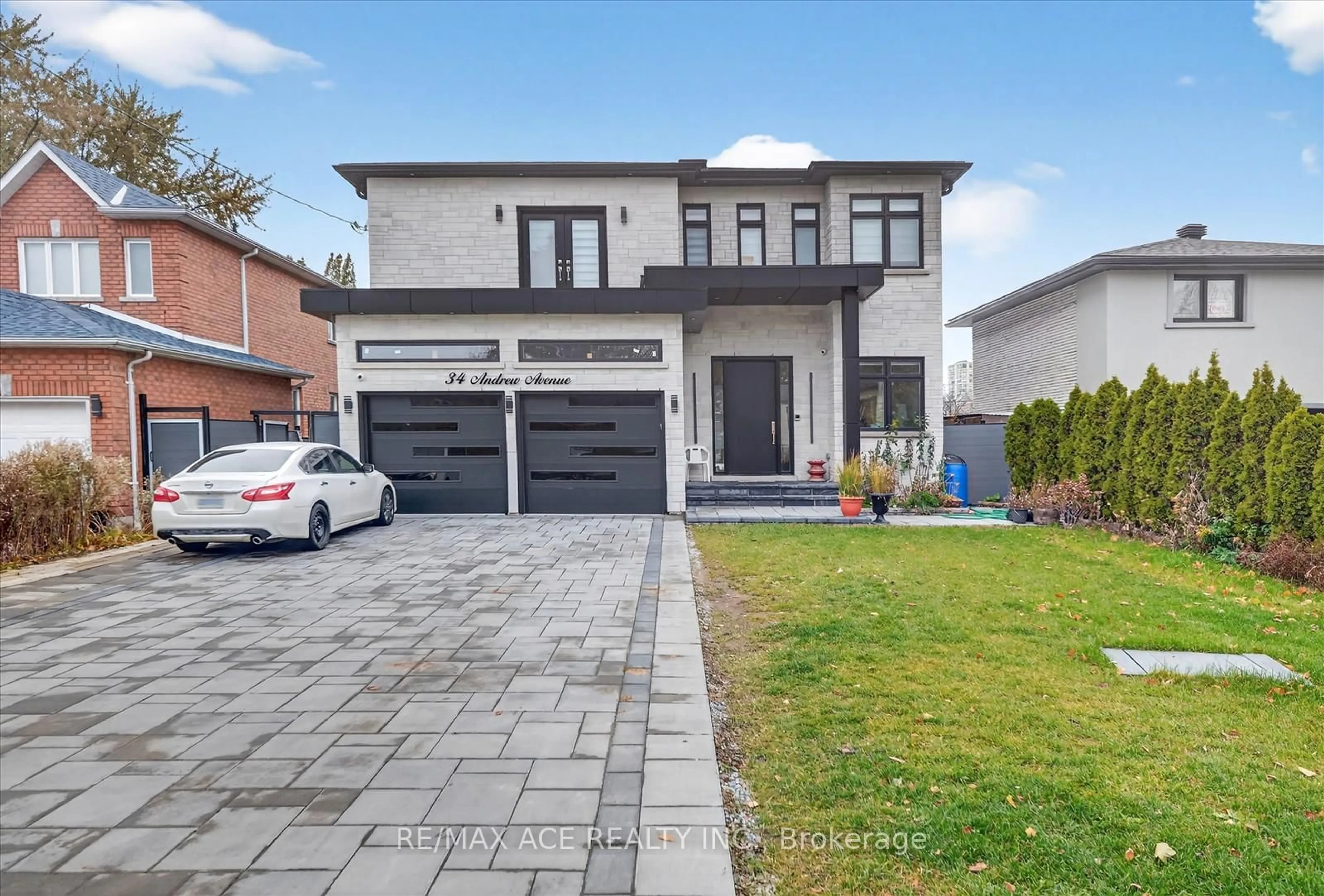 Home with brick exterior material, street for 34 Andrew Ave, Toronto Ontario M1M 3H2
