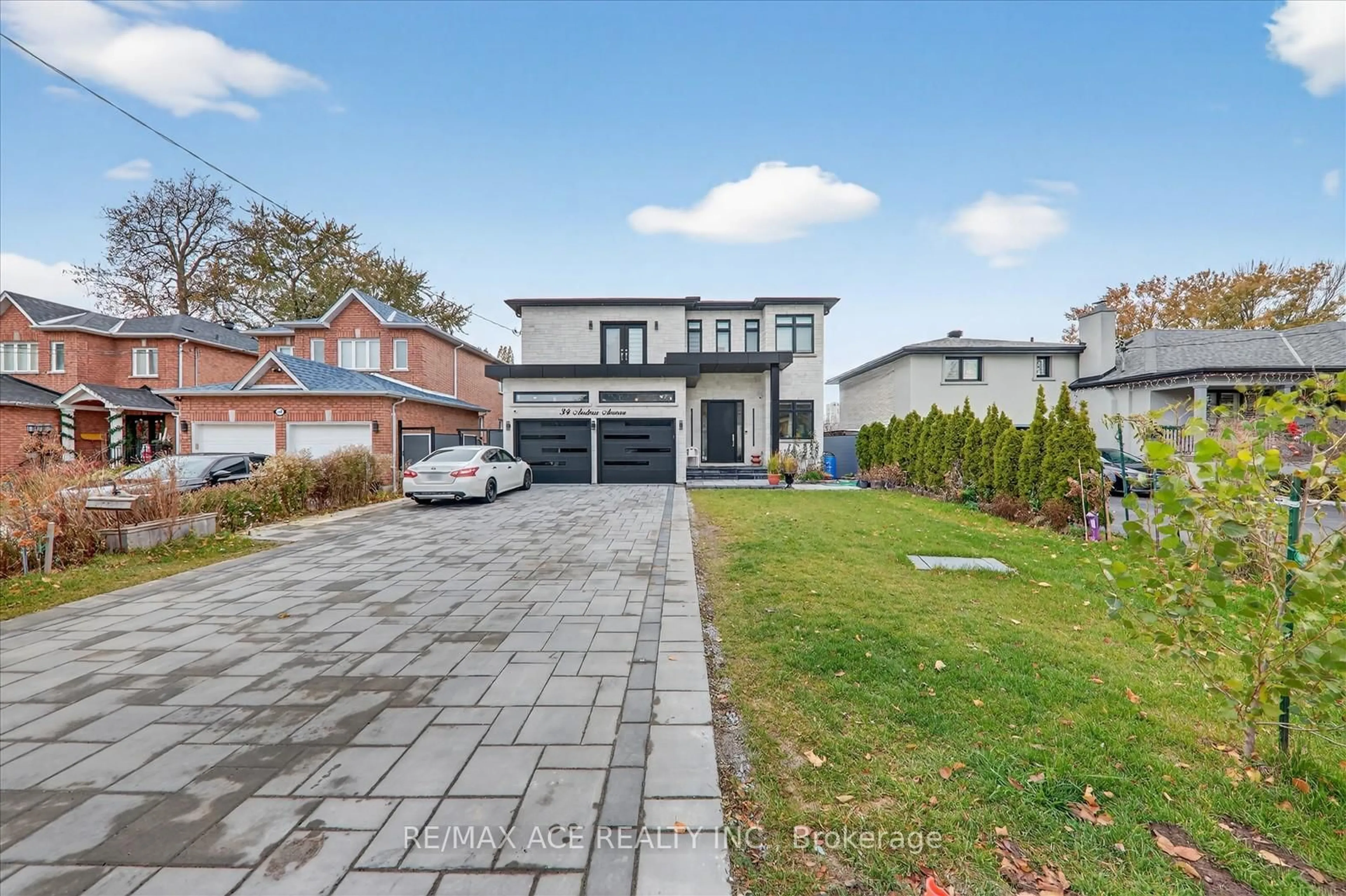 Home with brick exterior material, street for 34 Andrew Ave, Toronto Ontario M1M 3H2