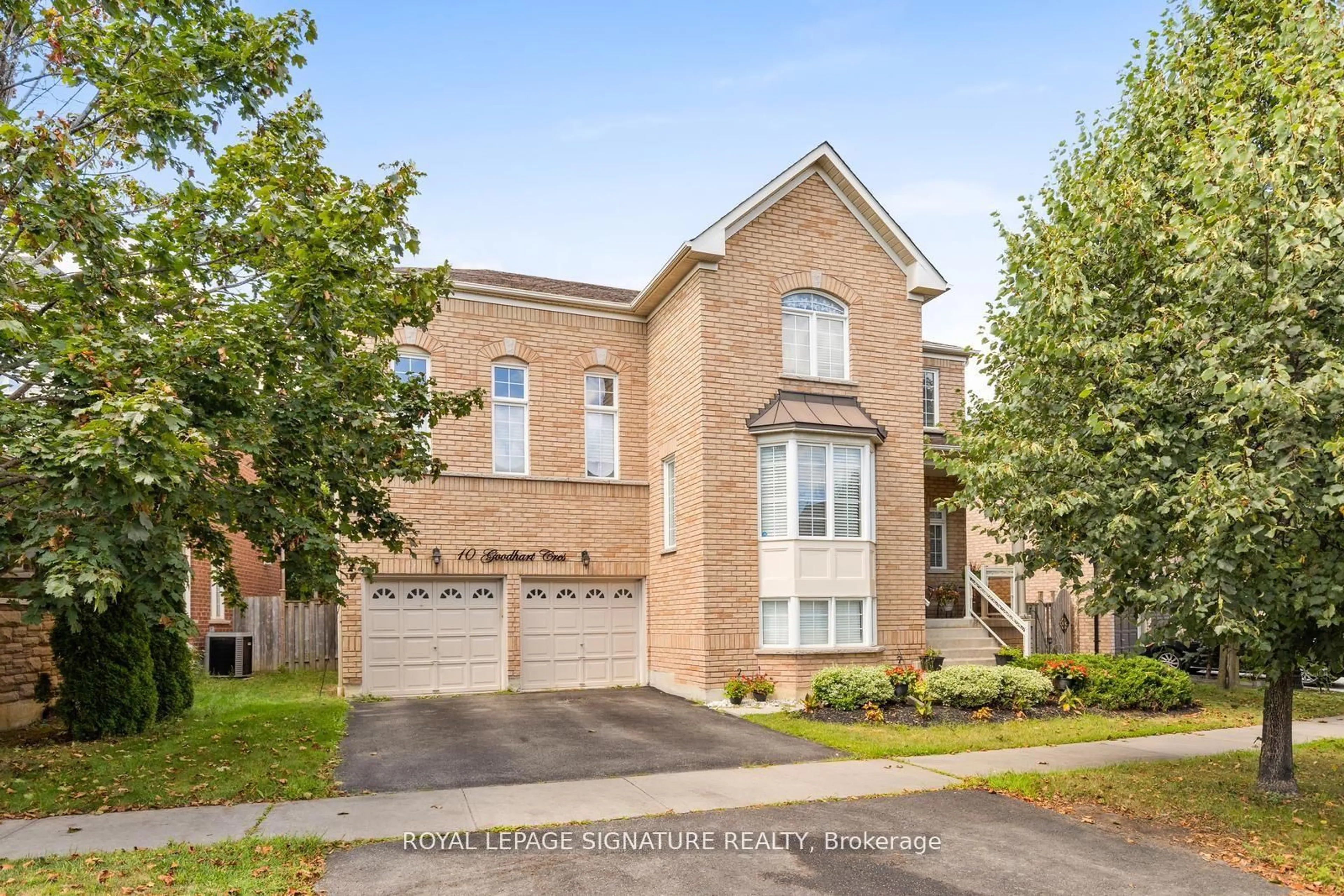 Home with brick exterior material, street for 10 Goodhart Cres, Ajax Ontario L1T 4J1