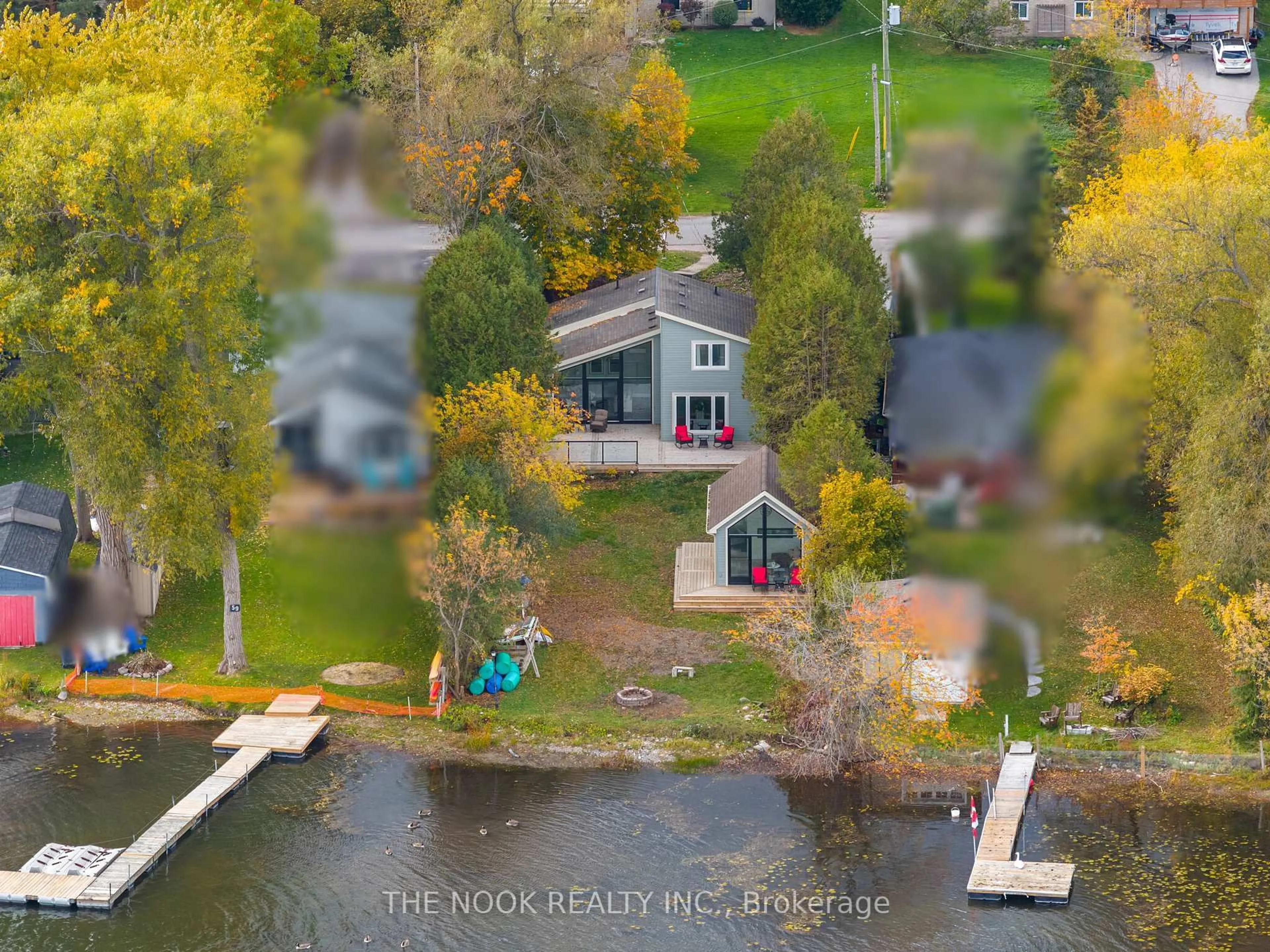 A pic from outside/outdoor area/front of a property/back of a property/a pic from drone, water/lake/river/ocean view for 55 Honey's Beach Rd, Scugog Ontario L9L 0B5
