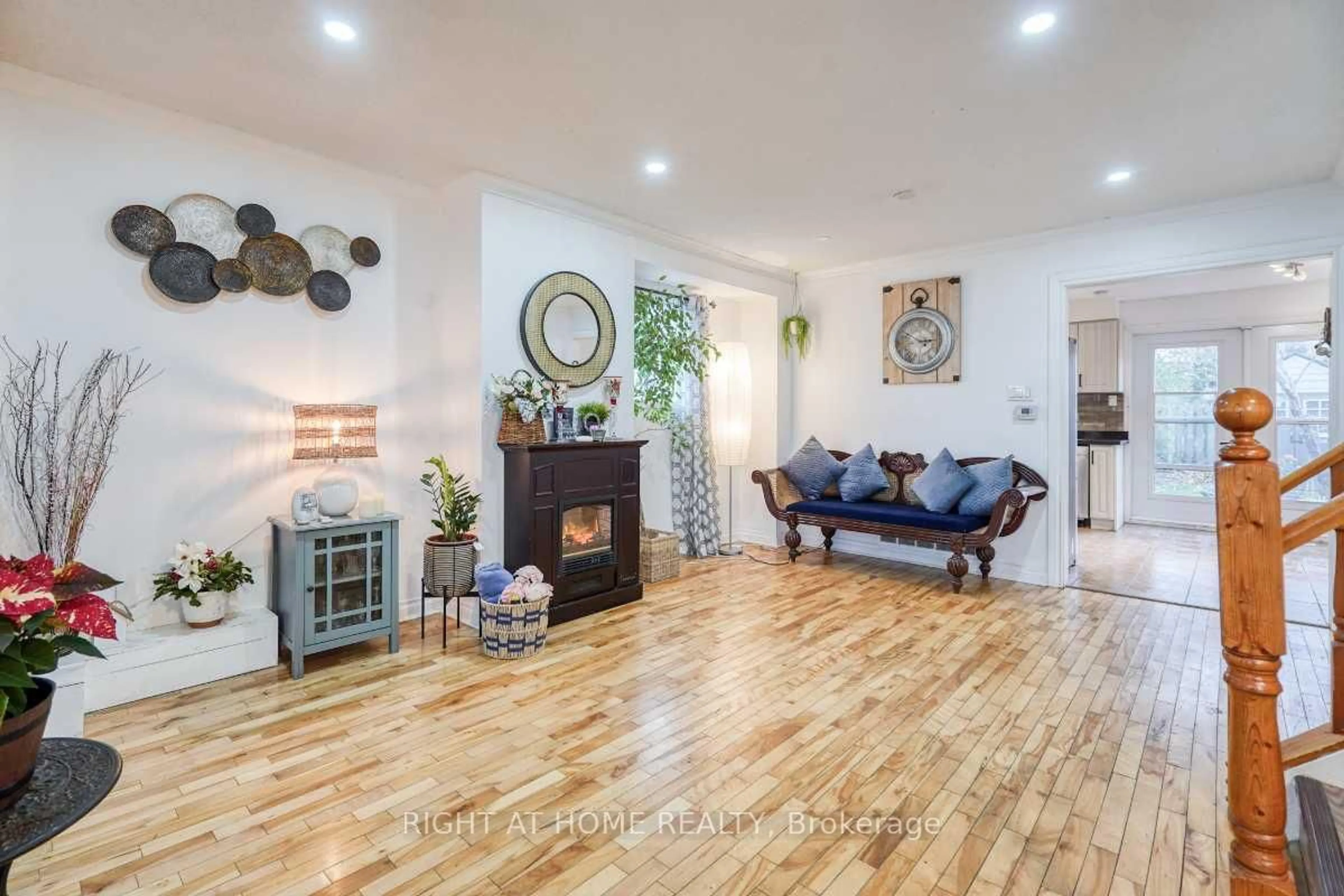 Living room with furniture, wood/laminate floor for 1456 Valley Dr, Oshawa Ontario L1J 7Z3