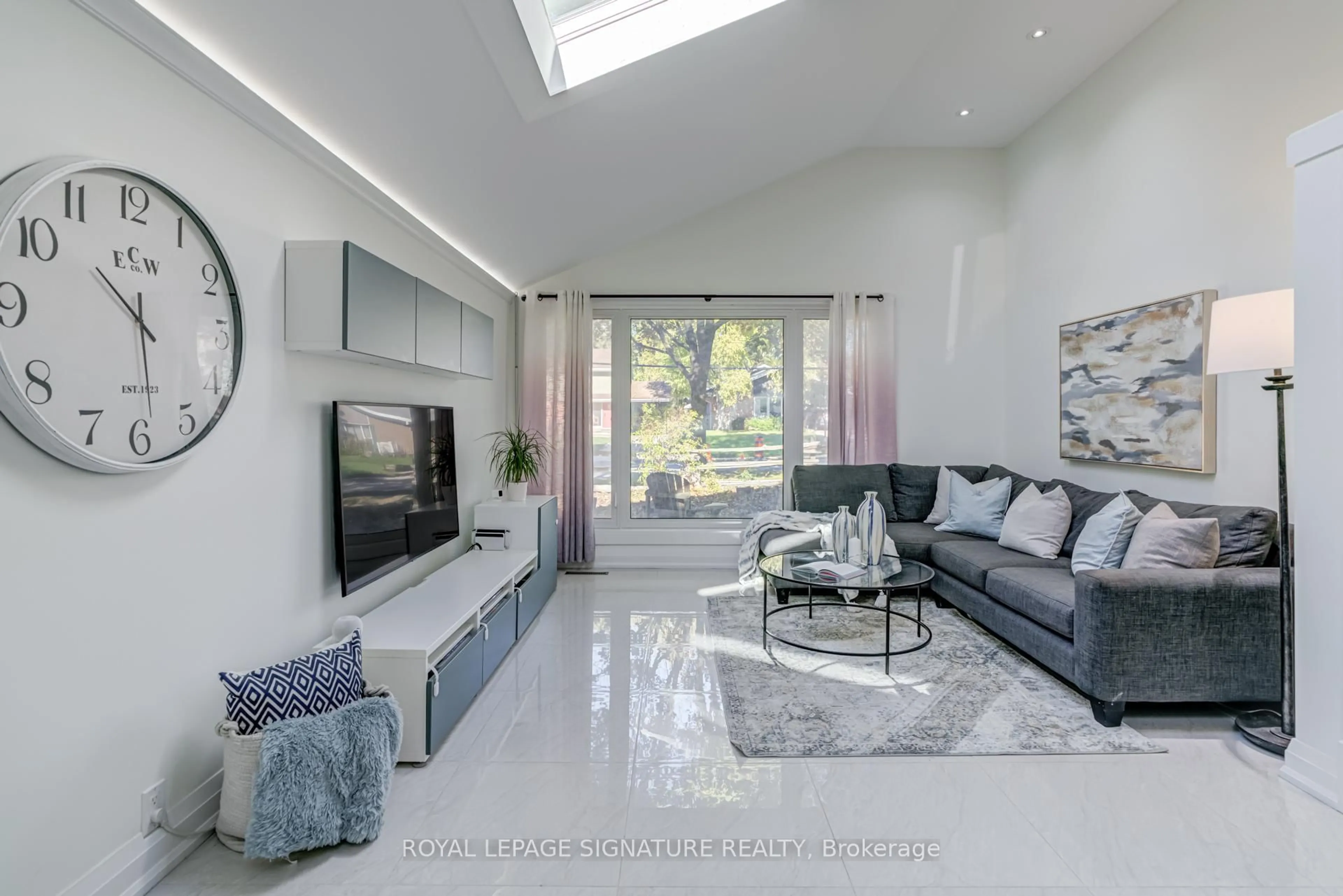 Living room with furniture, ceramic/tile floor for 57 Munson Cres, Toronto Ontario M1P 3M8