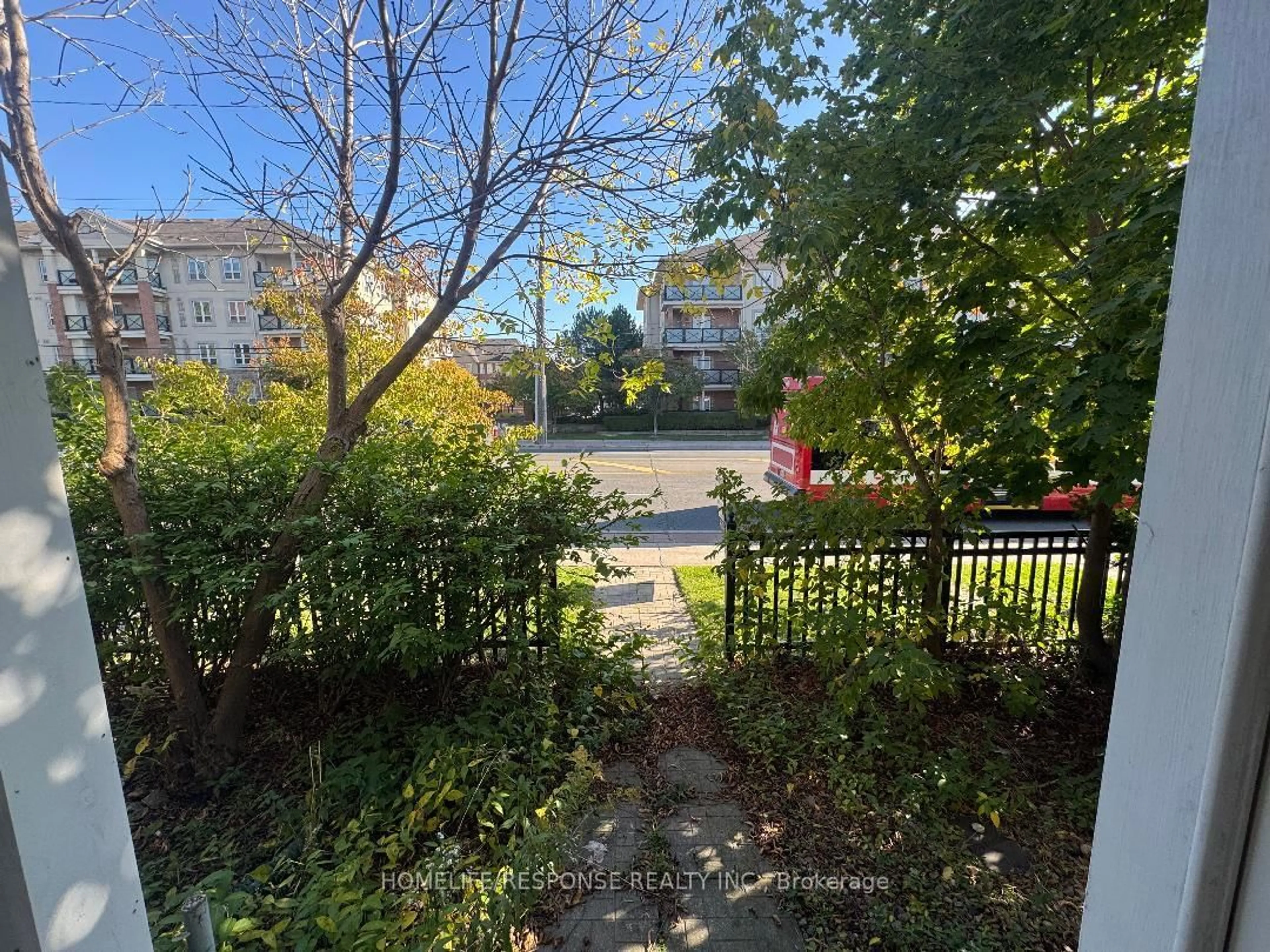 A pic from outside/outdoor area/front of a property/back of a property/a pic from drone, city buildings view from balcony for 712 Warden Ave #50, Toronto Ontario M1L 4W4