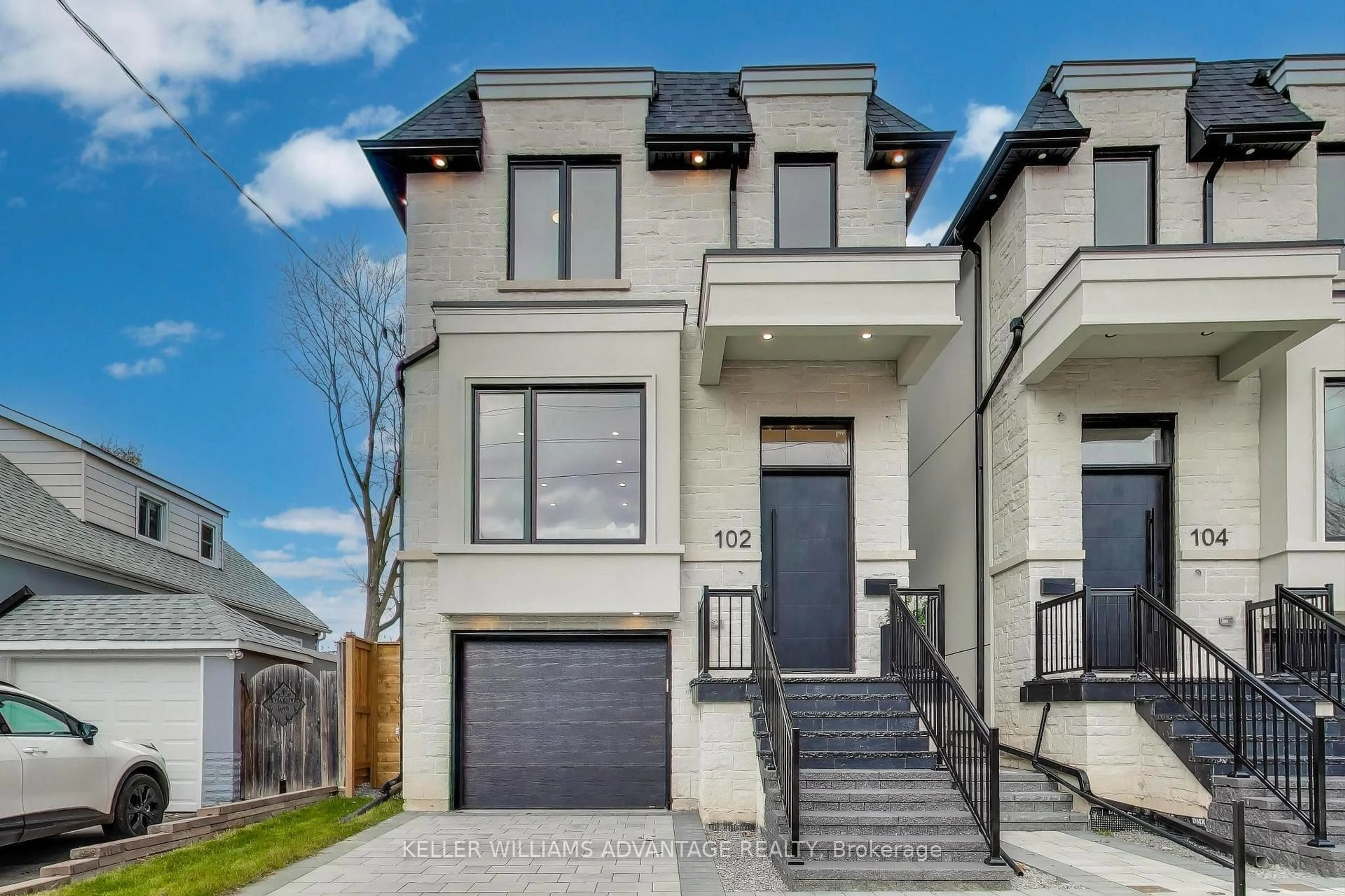 Home with brick exterior material, street for 102 Yardley Ave, Toronto Ontario M4B 2B1