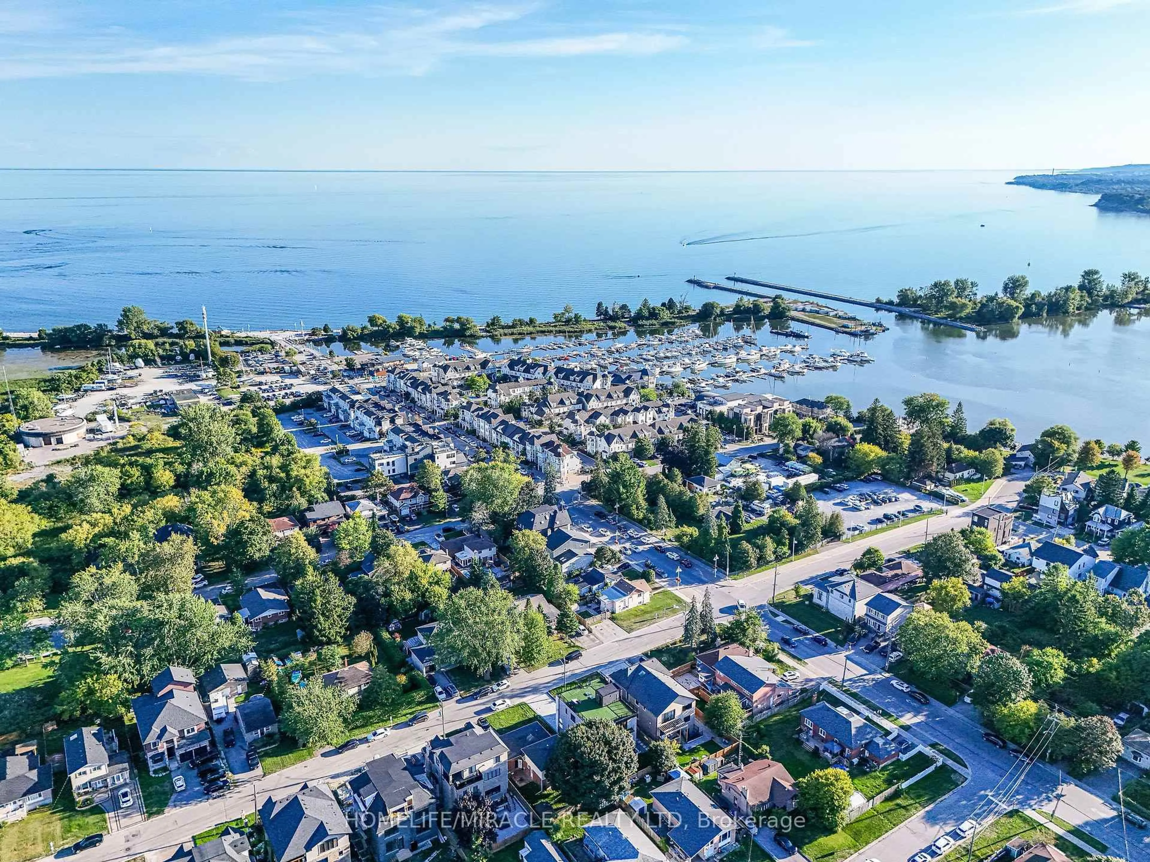 A pic from outside/outdoor area/front of a property/back of a property/a pic from drone, water/lake/river/ocean view for 636 Annland St, Pickering Ontario L1W 1B1