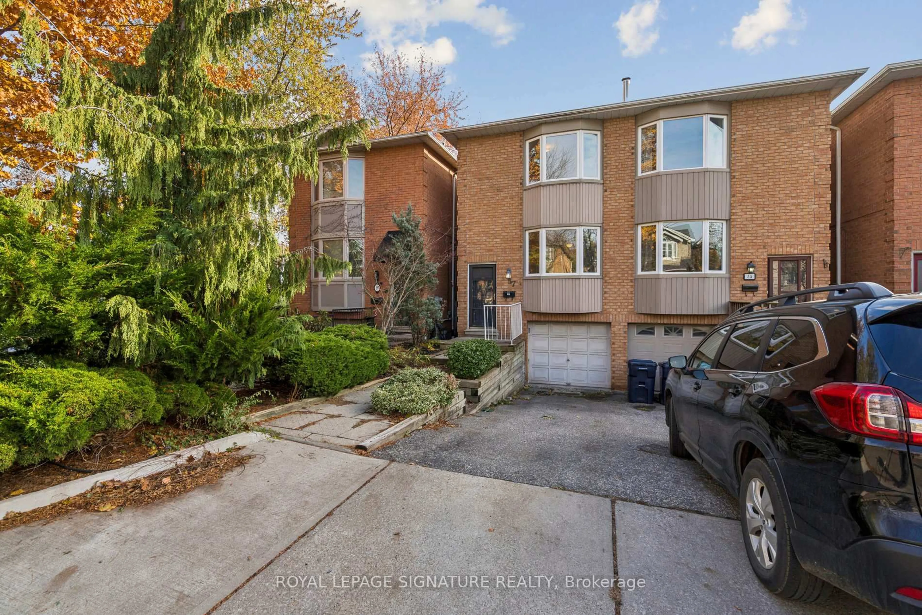 Home with brick exterior material, street for 57 Ashland Ave, Toronto Ontario M4L 1J9