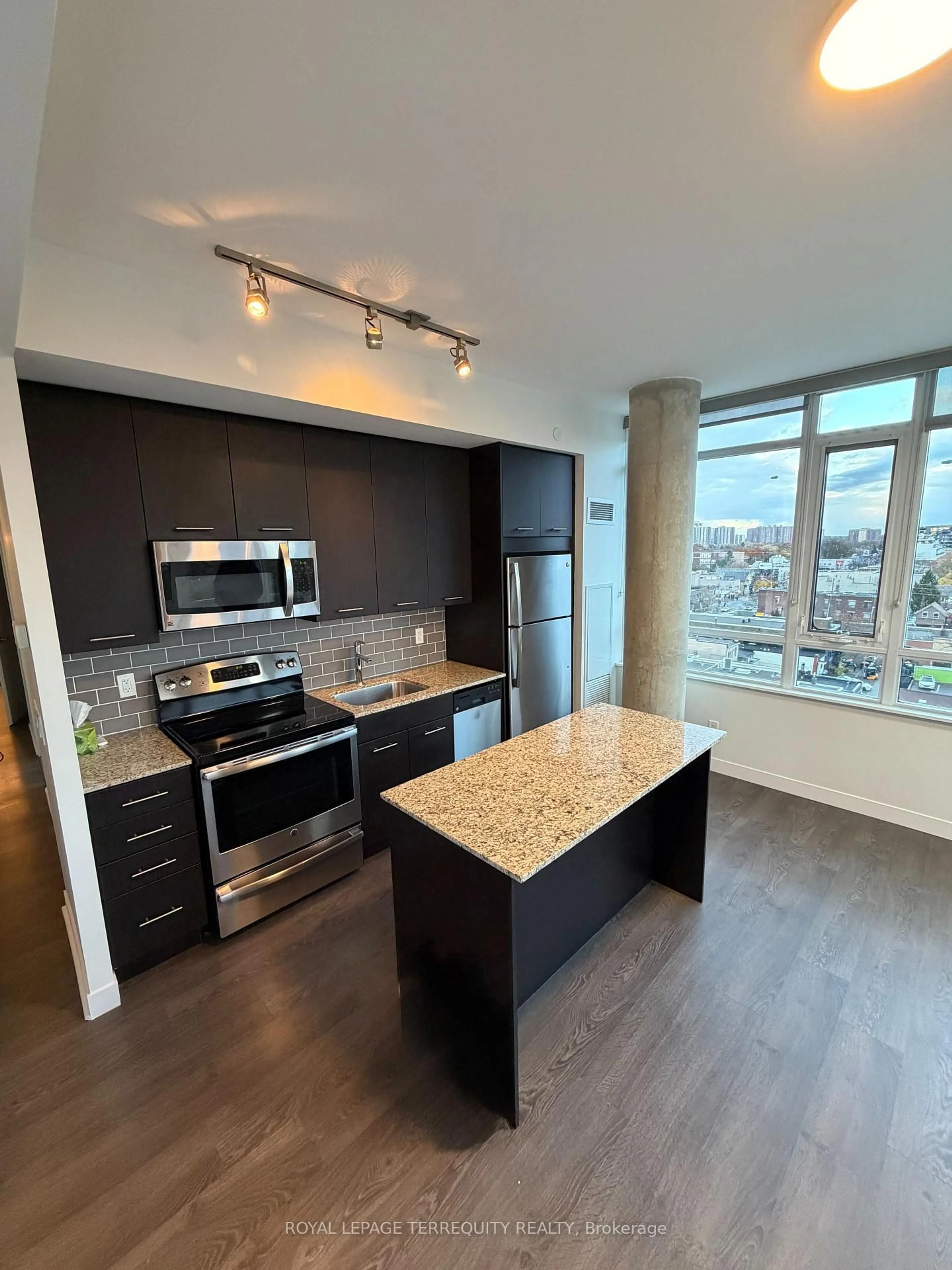 Open concept kitchen, unknown for 2055 Danforth Ave #910, Toronto Ontario M4C 1J8