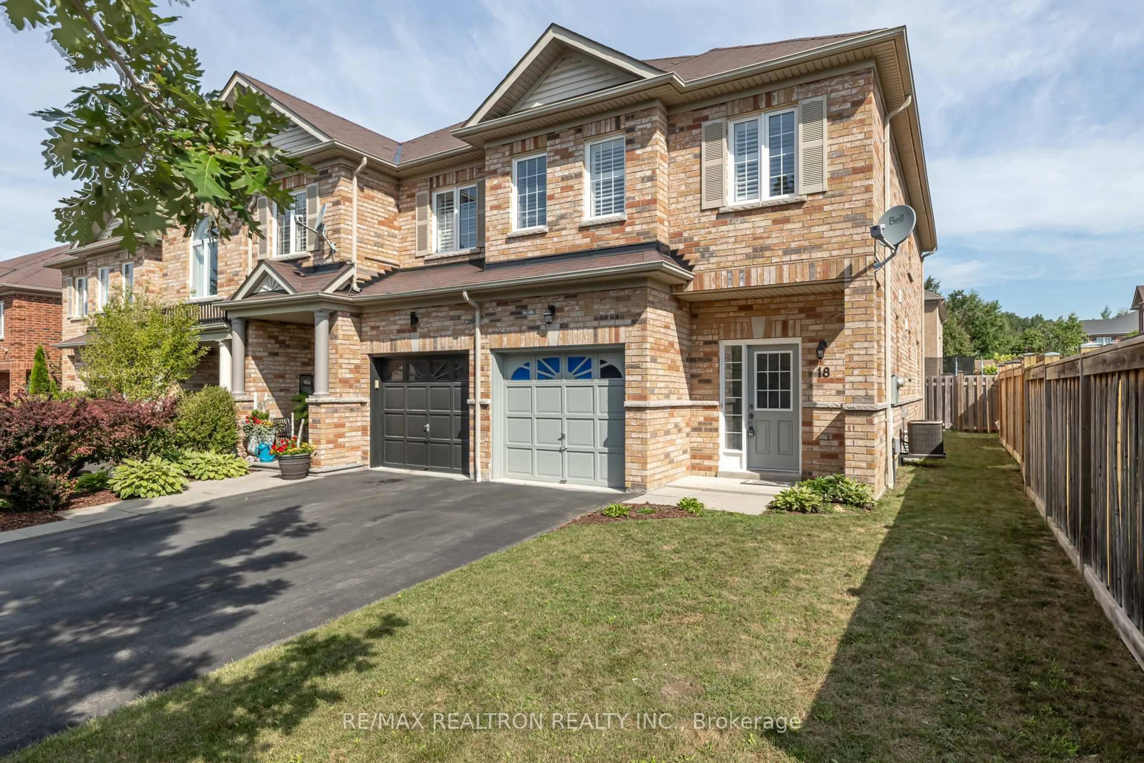 Home with brick exterior material, street for 18 Summerside Ave, Whitby Ontario L1R 0G3