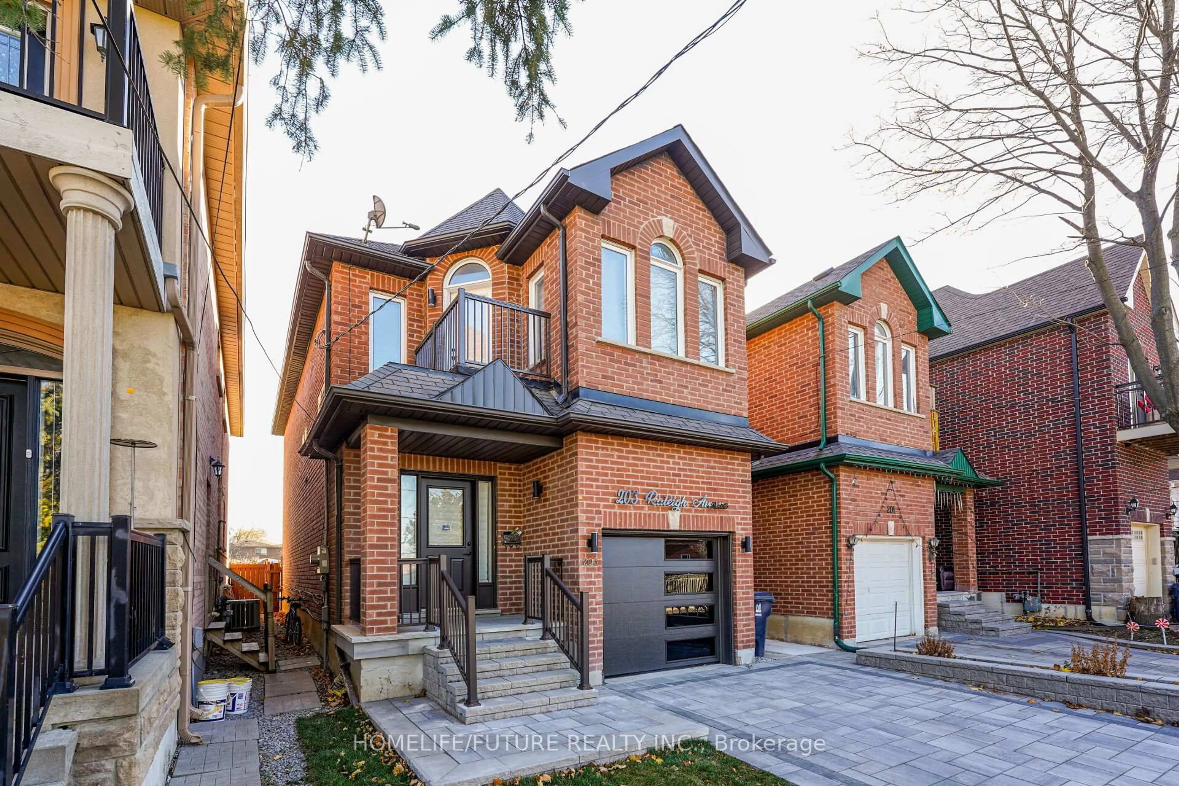 Home with brick exterior material, street for 203 Raleigh Ave, Toronto Ontario M1K 1A5