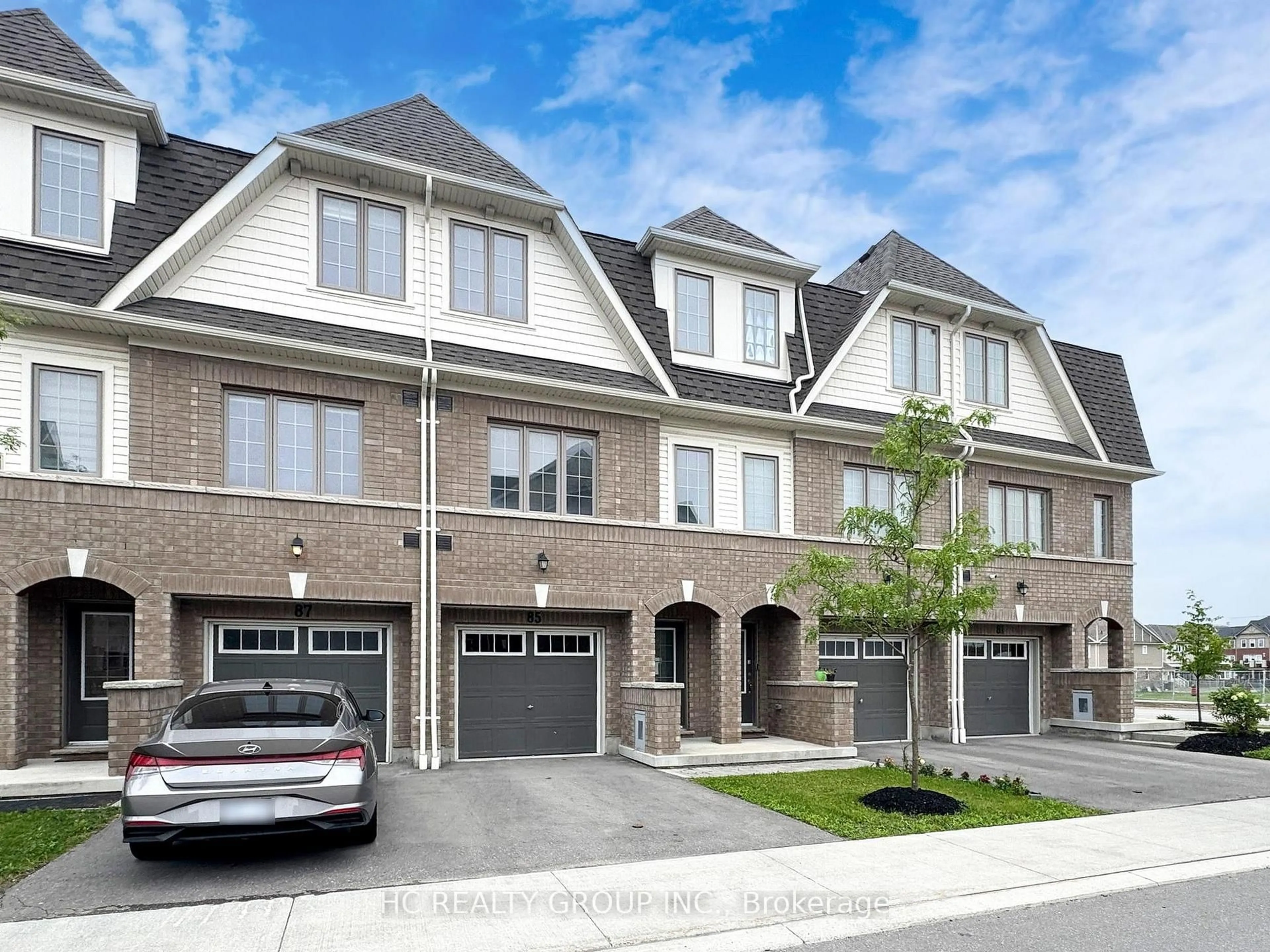 Home with brick exterior material, street for 85 Danzatore Path, Oshawa Ontario L1L 0P9