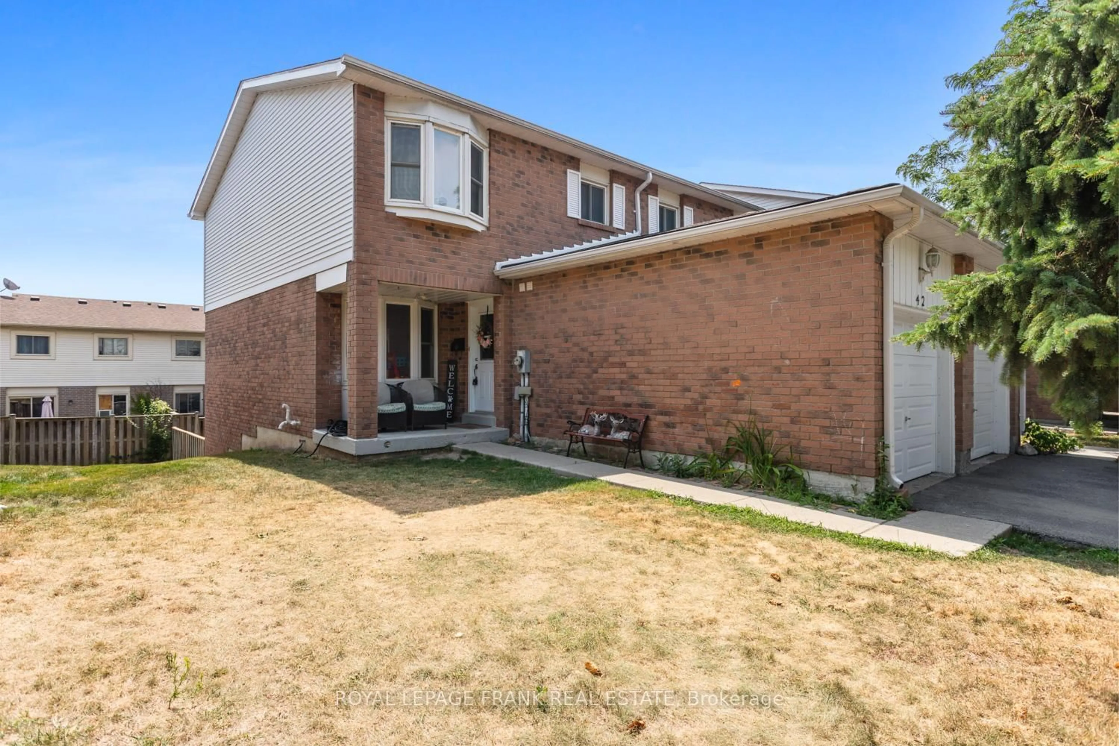 Home with brick exterior material, street for 700 Harmony Rd #42, Oshawa Ontario L1K 1S2