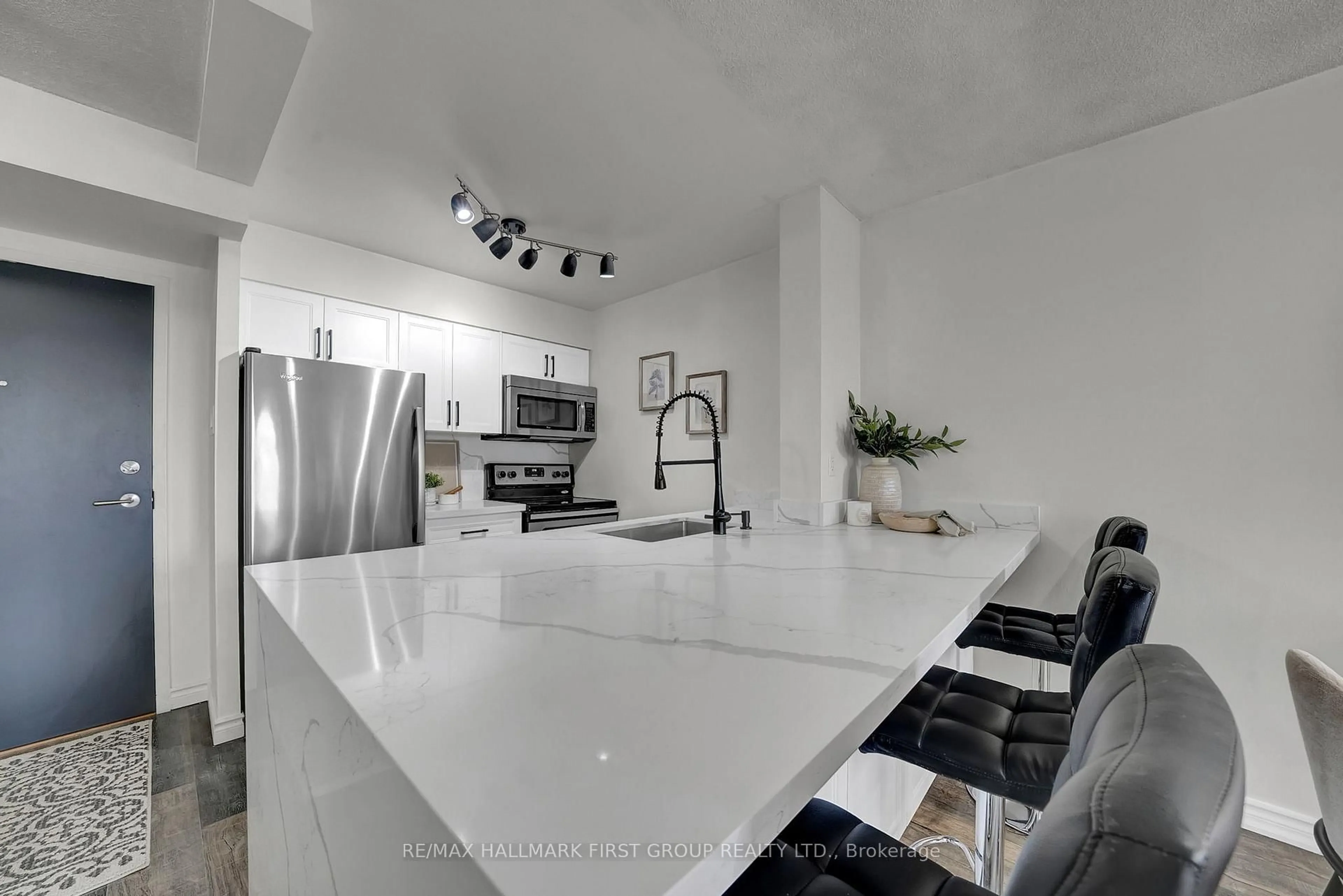 Open concept kitchen, ceramic/tile floor for 1665 Pickering Pkwy #405, Pickering Ontario L1V 6L4