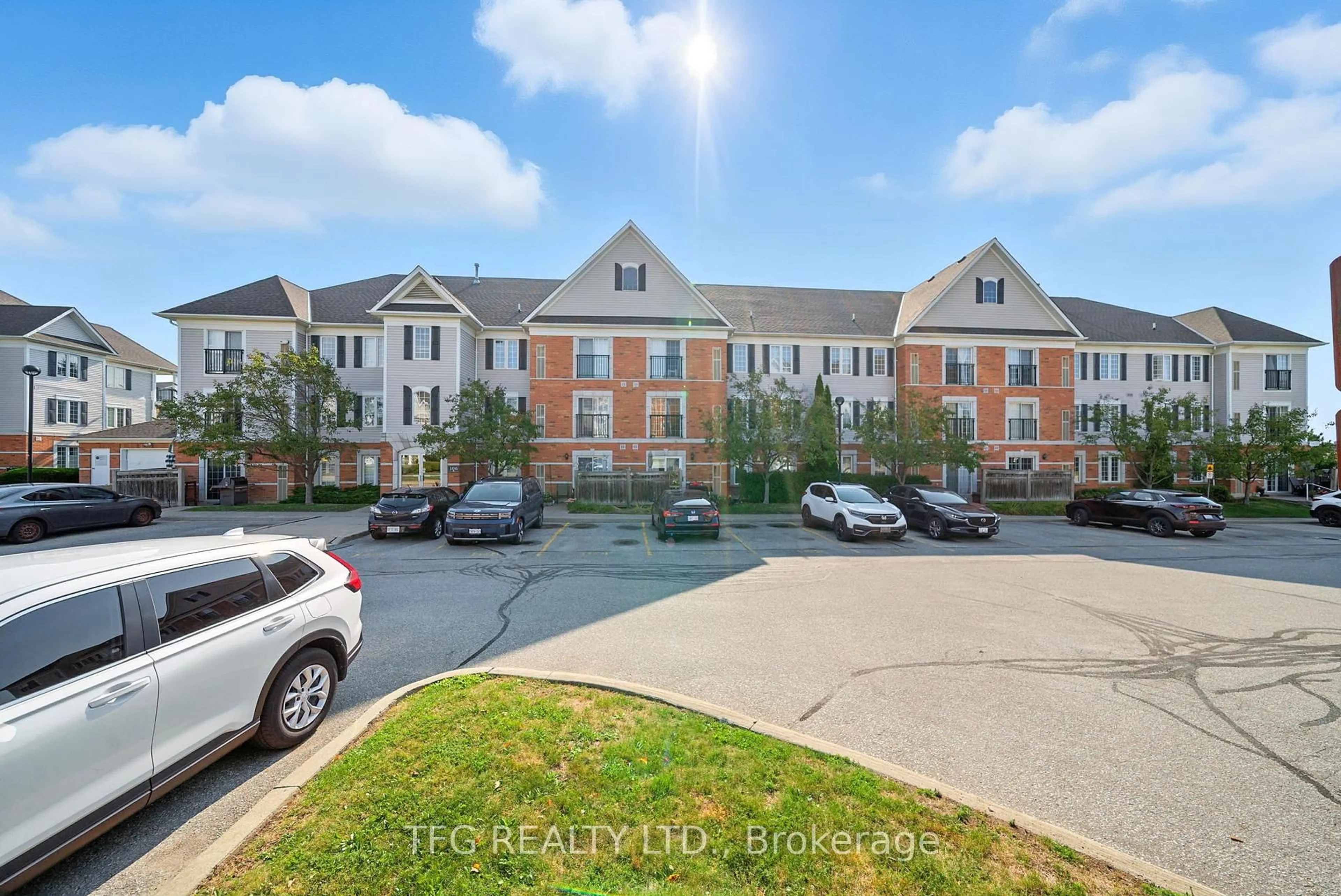 A pic from outside/outdoor area/front of a property/back of a property/a pic from drone, unknown for 106 Aspen Springs Dr #211, Clarington Ontario L1C 5N7