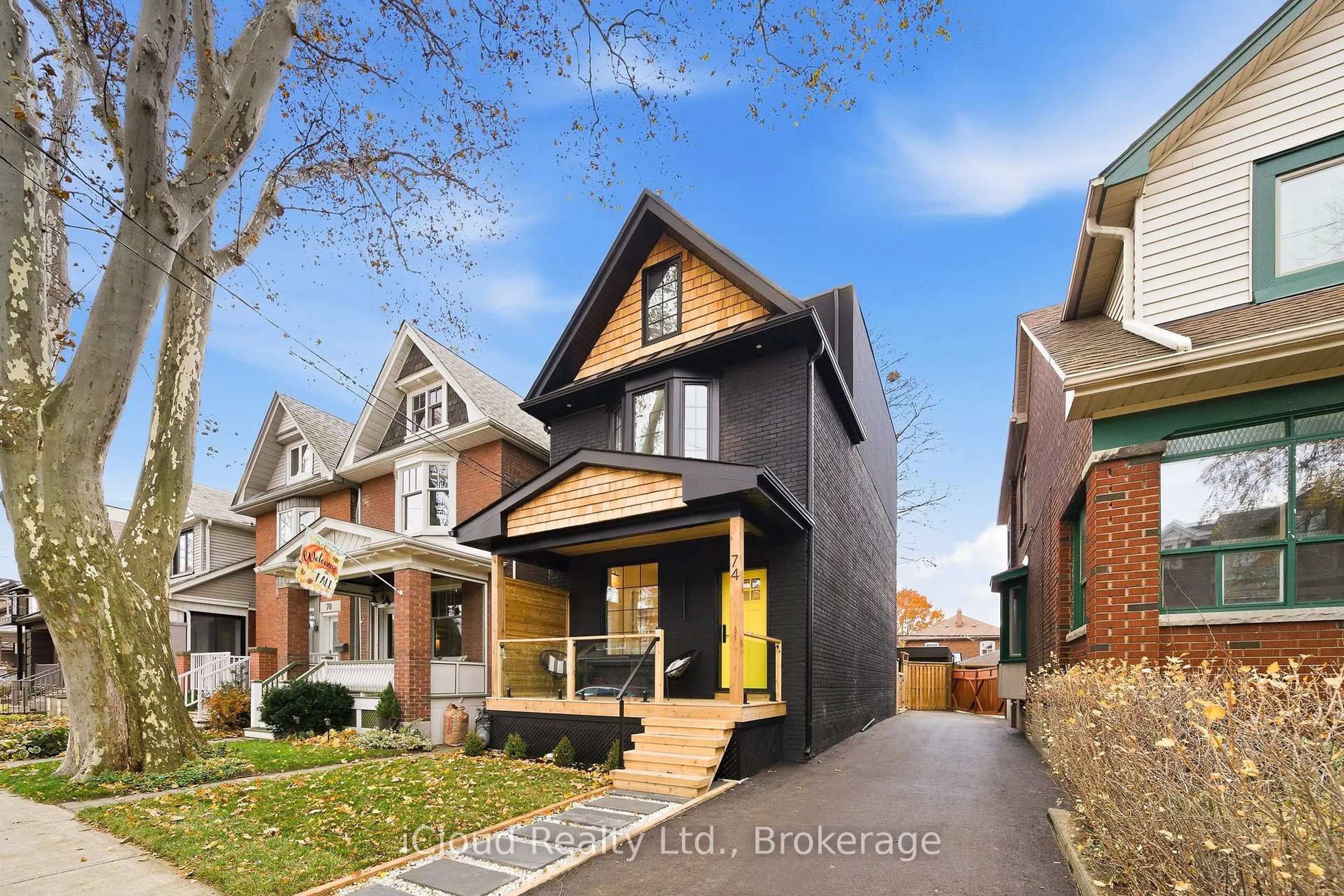Home with brick exterior material, street for 74 Langford Ave, Toronto Ontario M4J 3E3