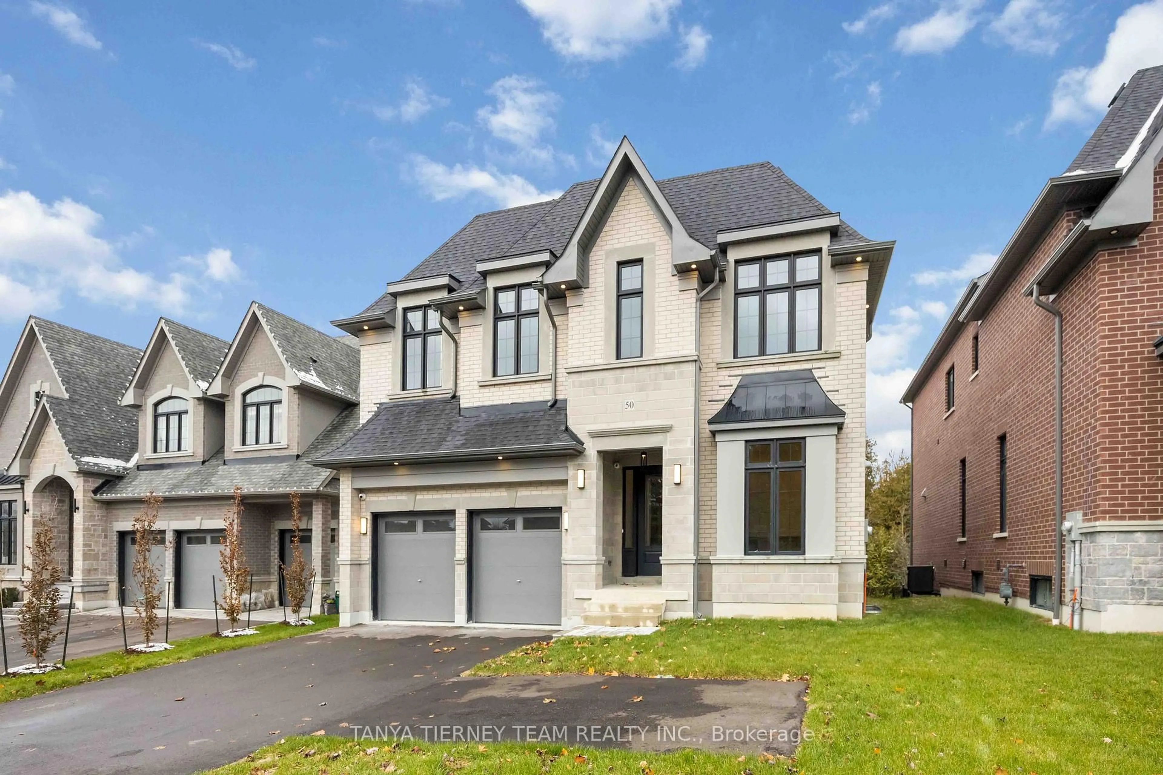 Home with brick exterior material, street for 50 Carnwith Dr, Whitby Ontario L1M 2N1