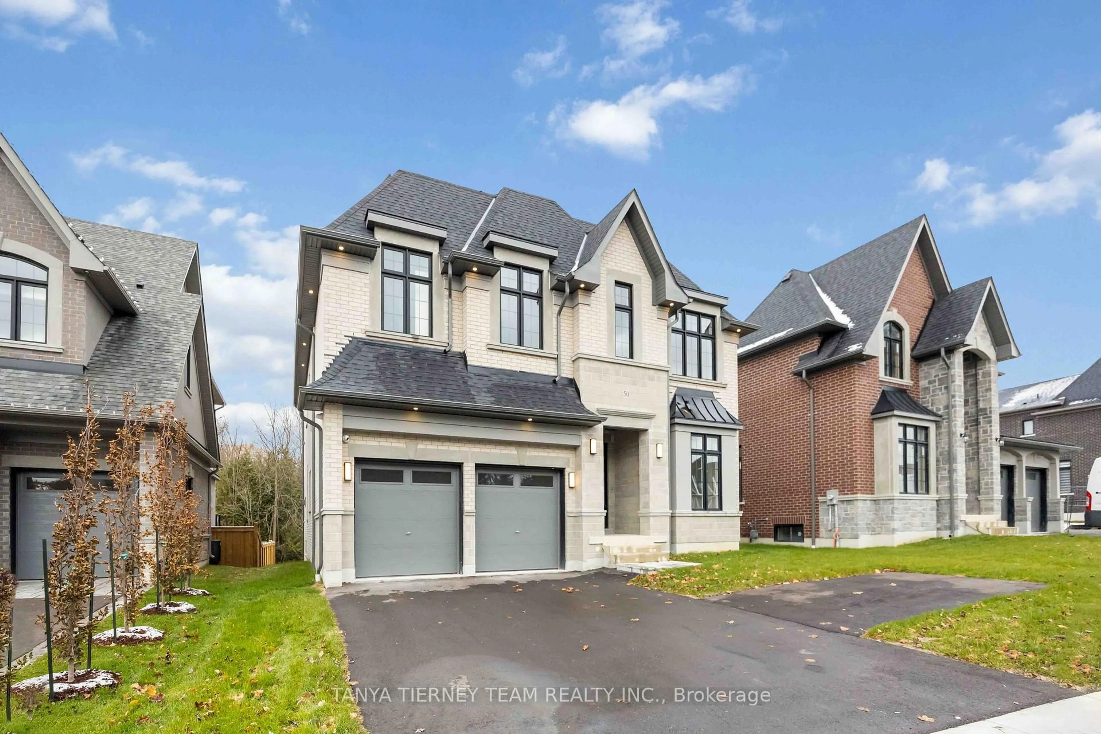 Home with brick exterior material, street for 50 Carnwith Dr, Whitby Ontario L1M 2N1