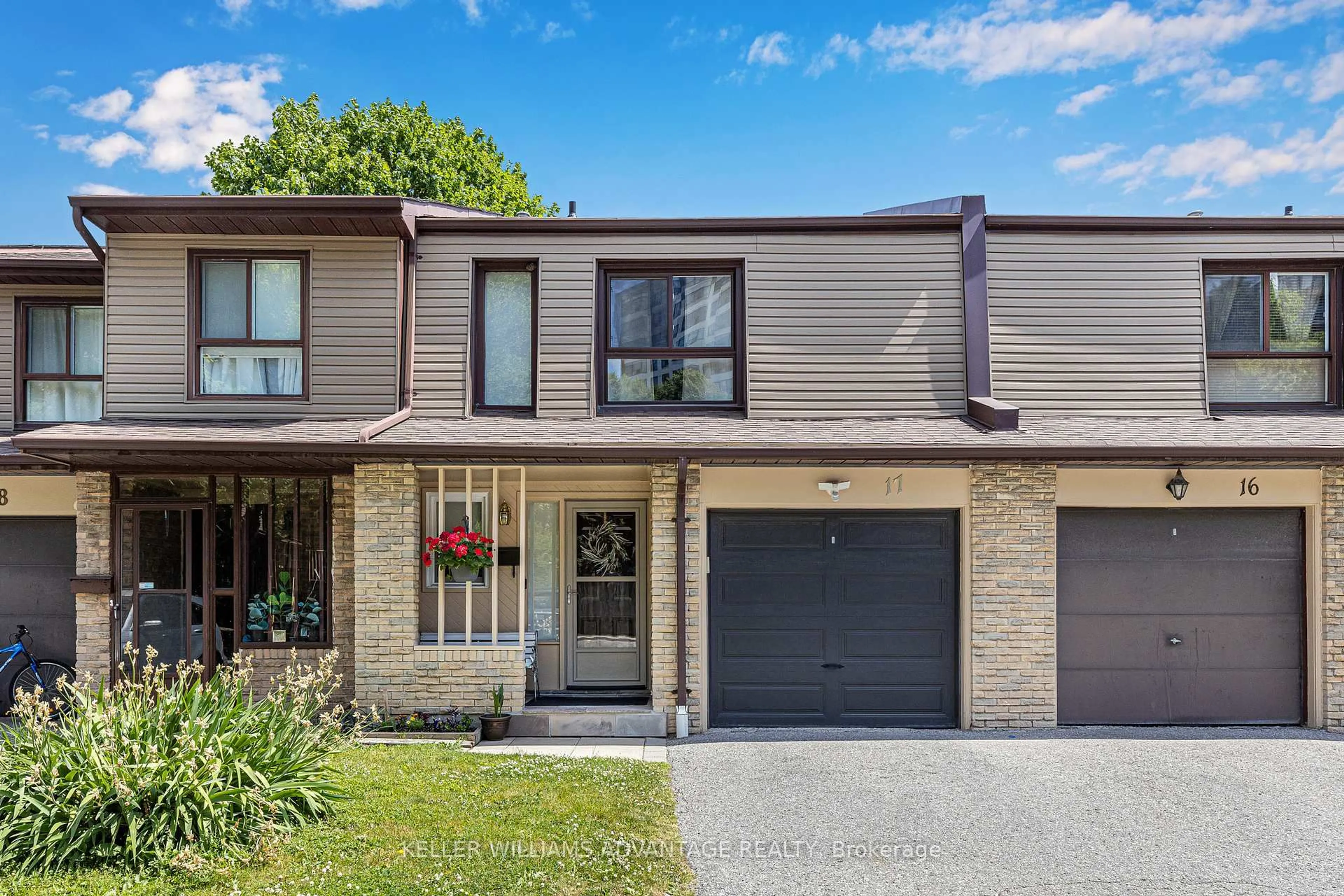 Home with brick exterior material, street for 1051 Sandhurst Circ #17, Toronto Ontario M1V 1T9