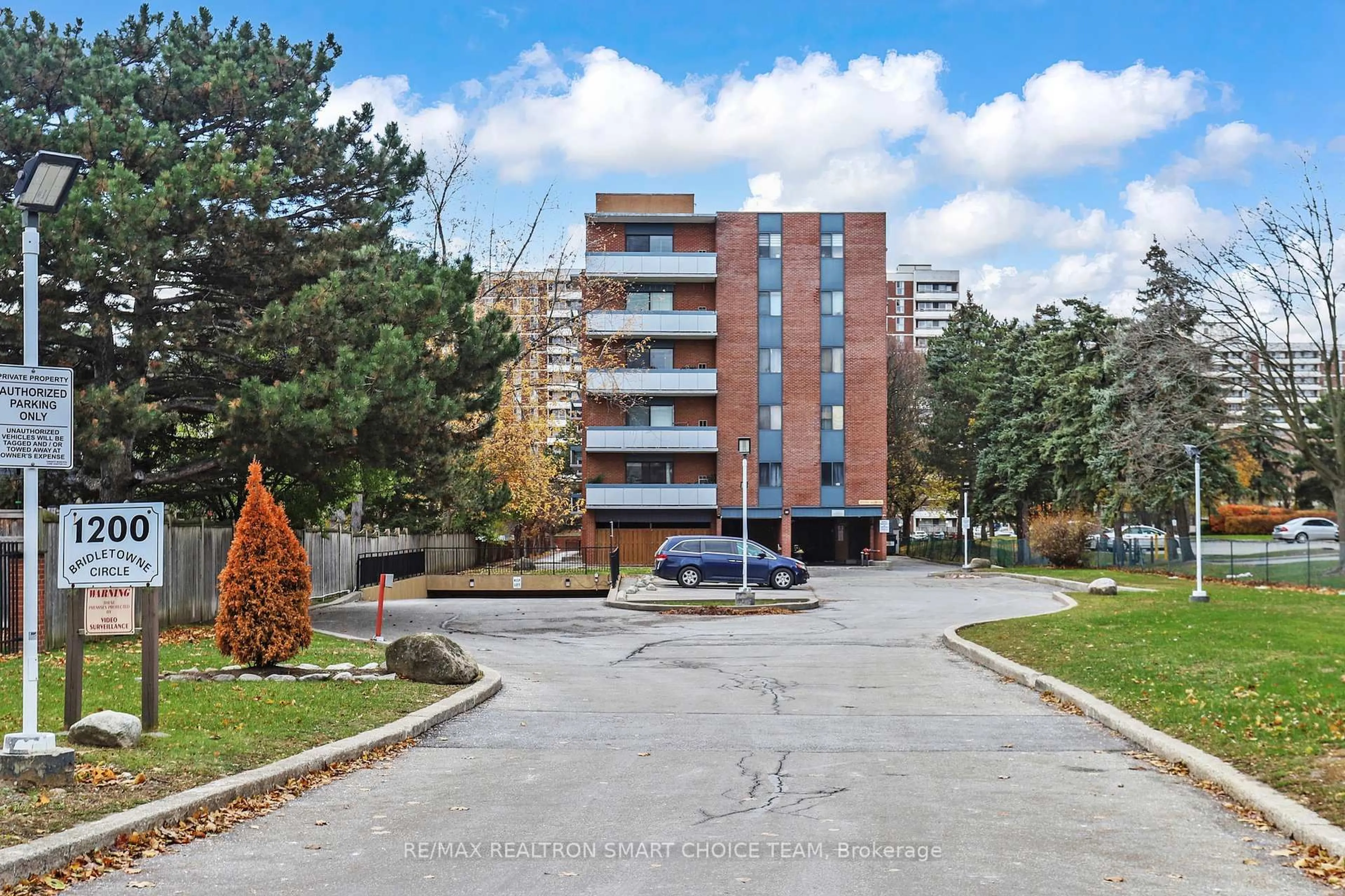 A pic from outside/outdoor area/front of a property/back of a property/a pic from drone, street for 1200 Bridletowne Circ #507, Toronto Ontario M1W 2H8