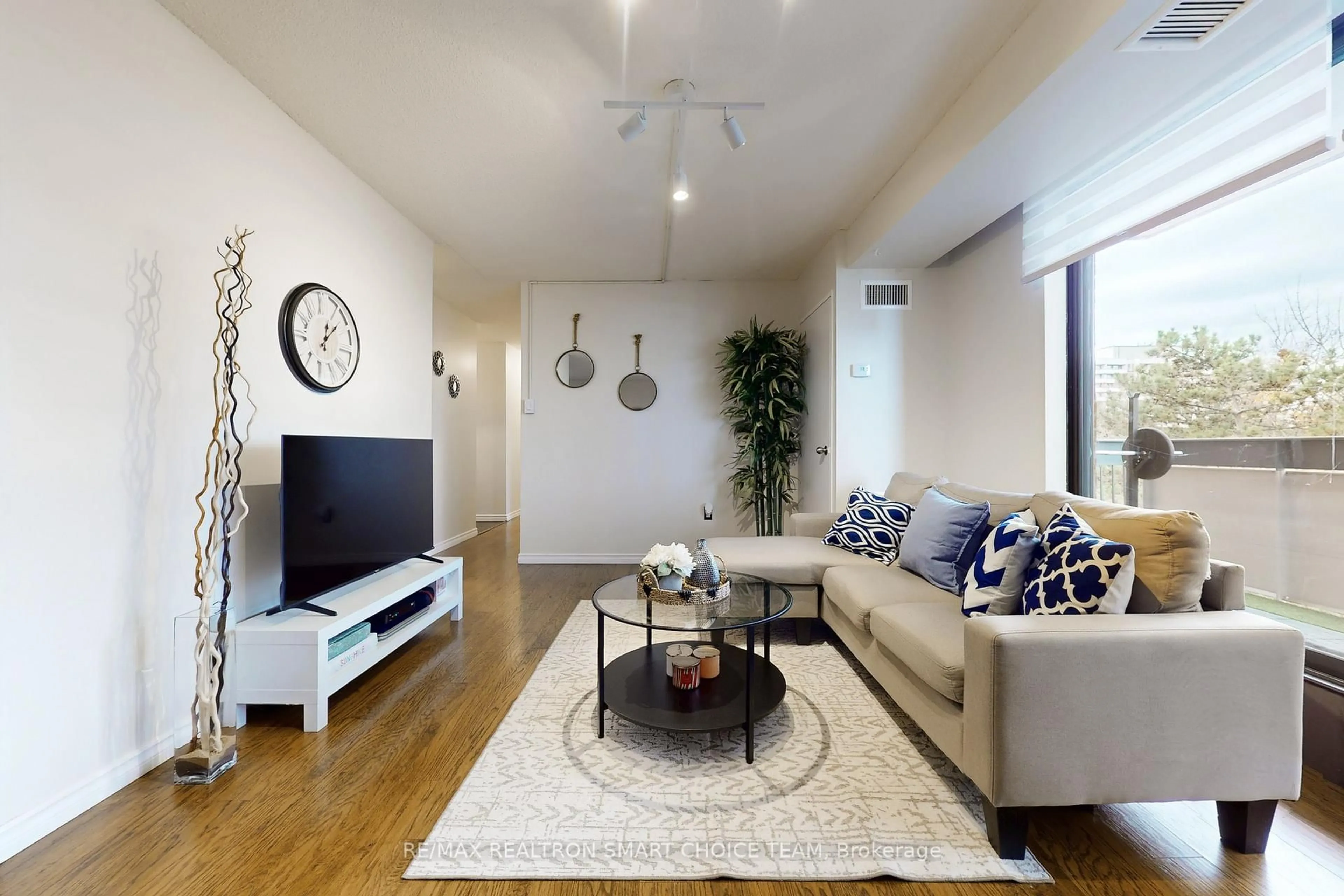 Living room with furniture, unknown for 1200 Bridletowne Circ #507, Toronto Ontario M1W 2H8