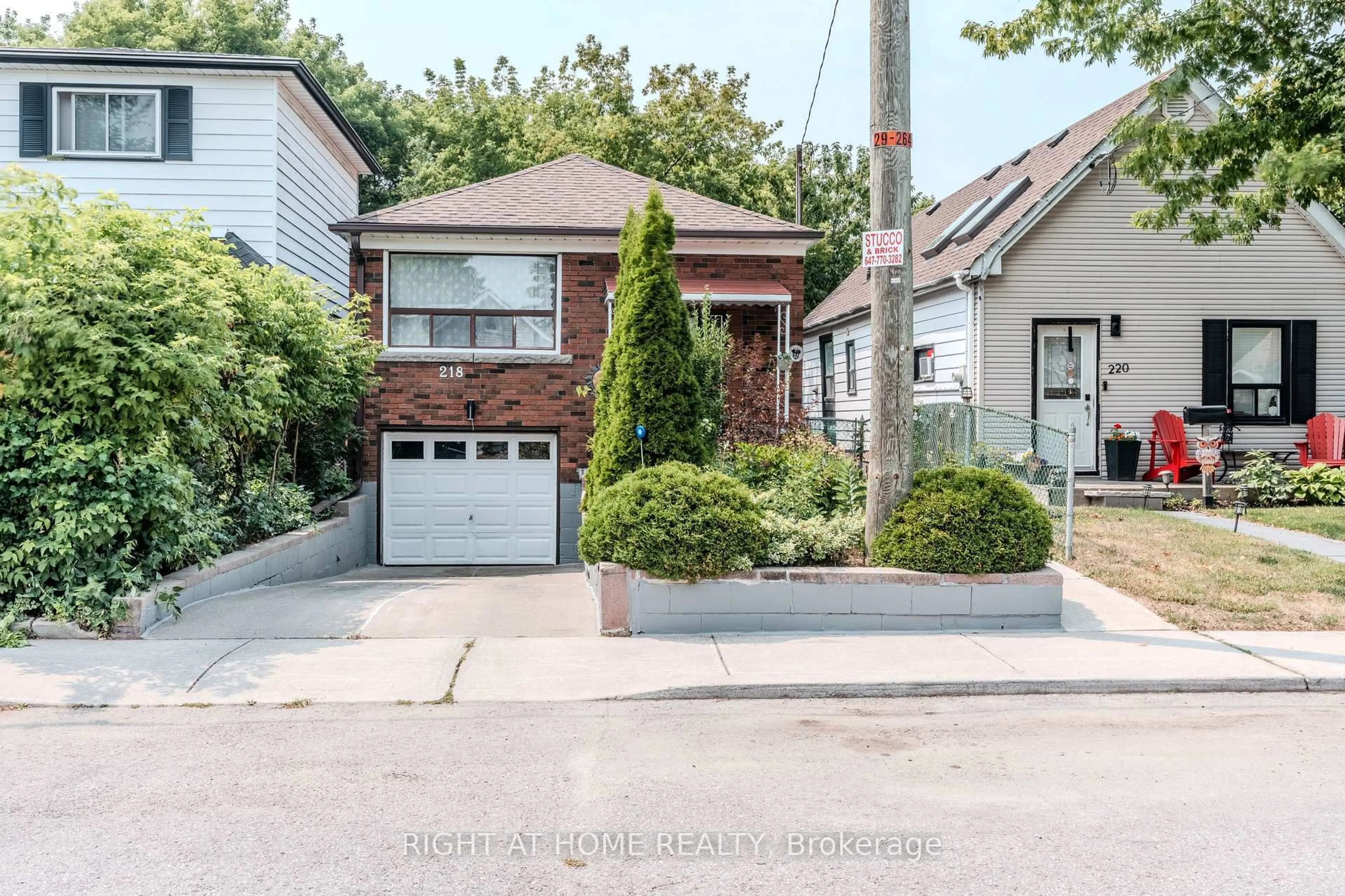 Home with brick exterior material, street for 218 South Woodrow Blvd, Toronto Ontario M1N 3L9