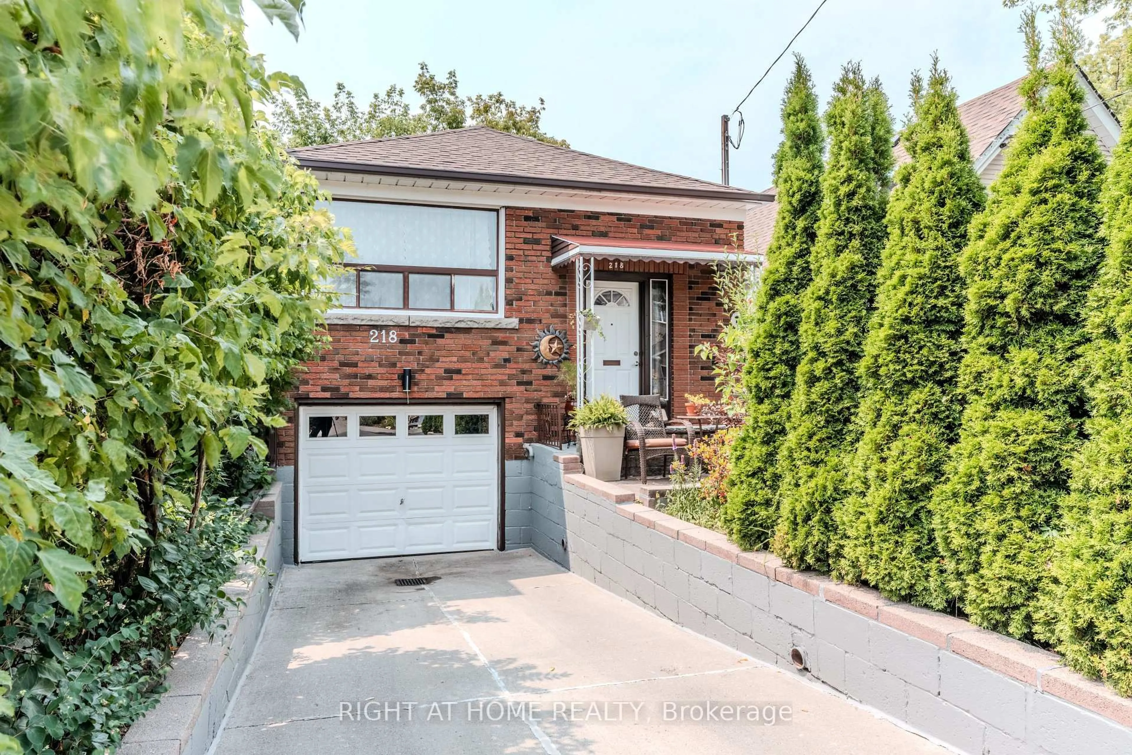 Home with brick exterior material, street for 218 South Woodrow Blvd, Toronto Ontario M1N 3L9