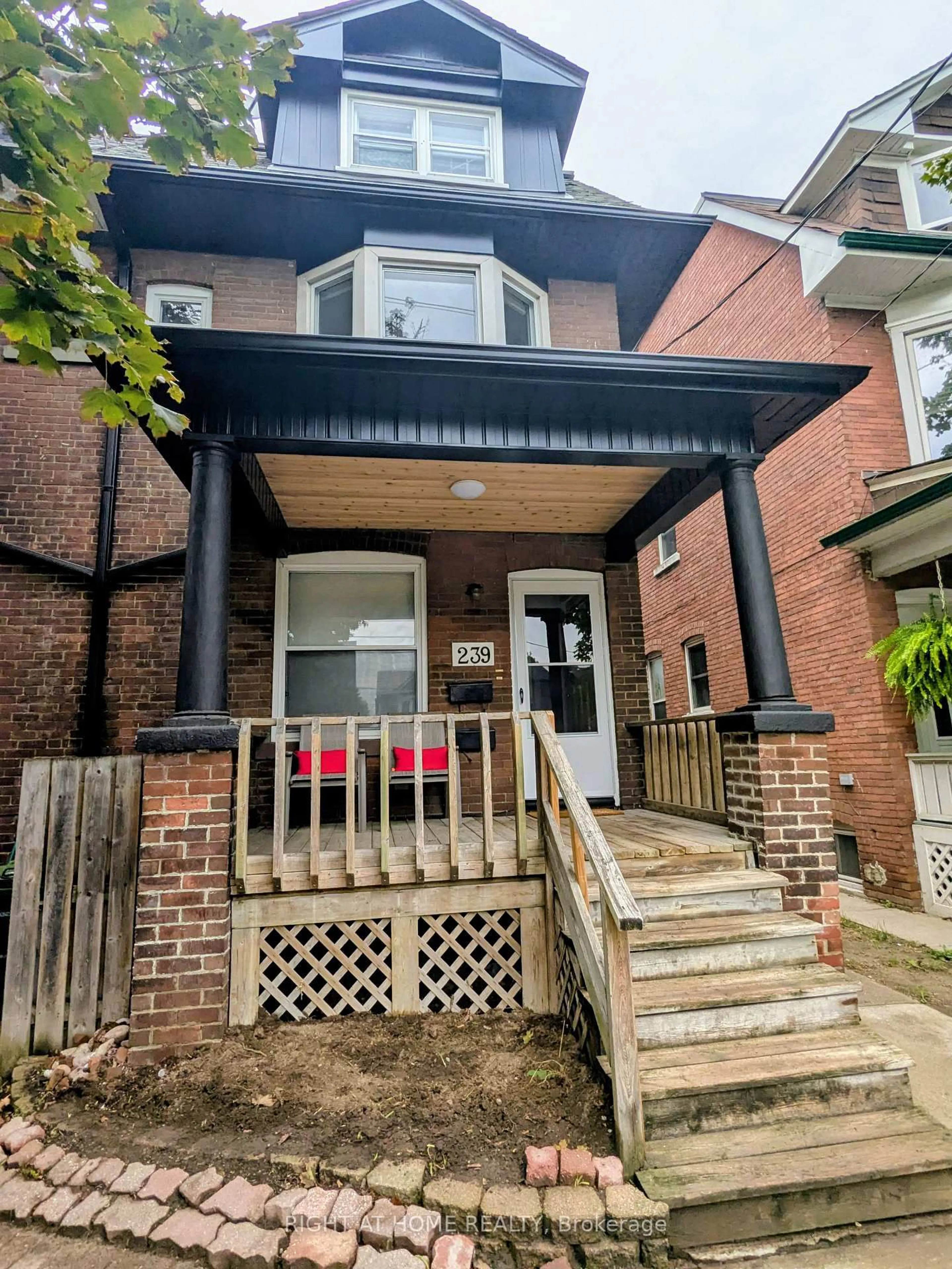 Home with brick exterior material, street for 239 Woodbine Ave, Toronto Ontario M4L 3P3