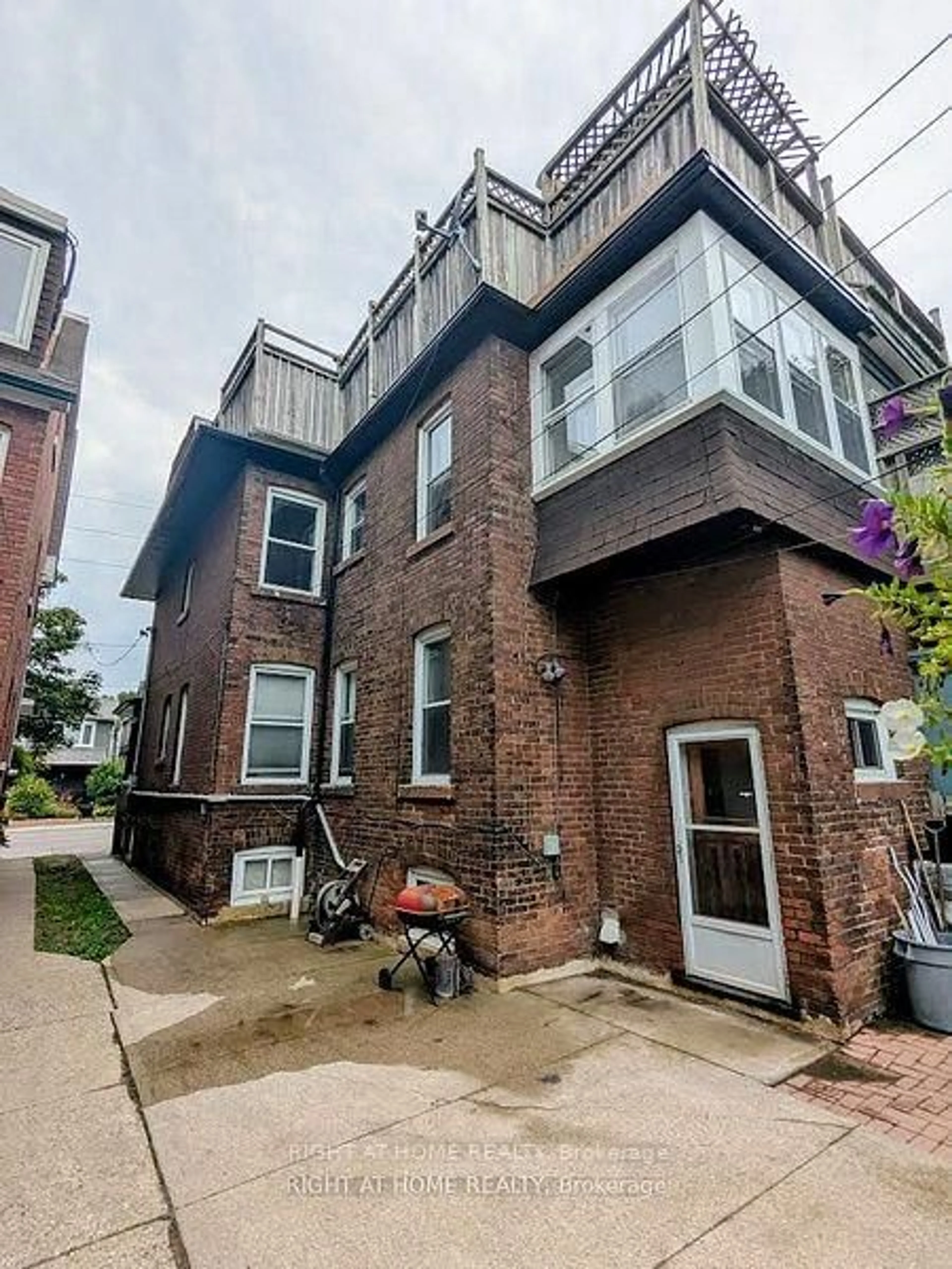 Home with brick exterior material, street for 239 Woodbine Ave, Toronto Ontario M4L 3P3
