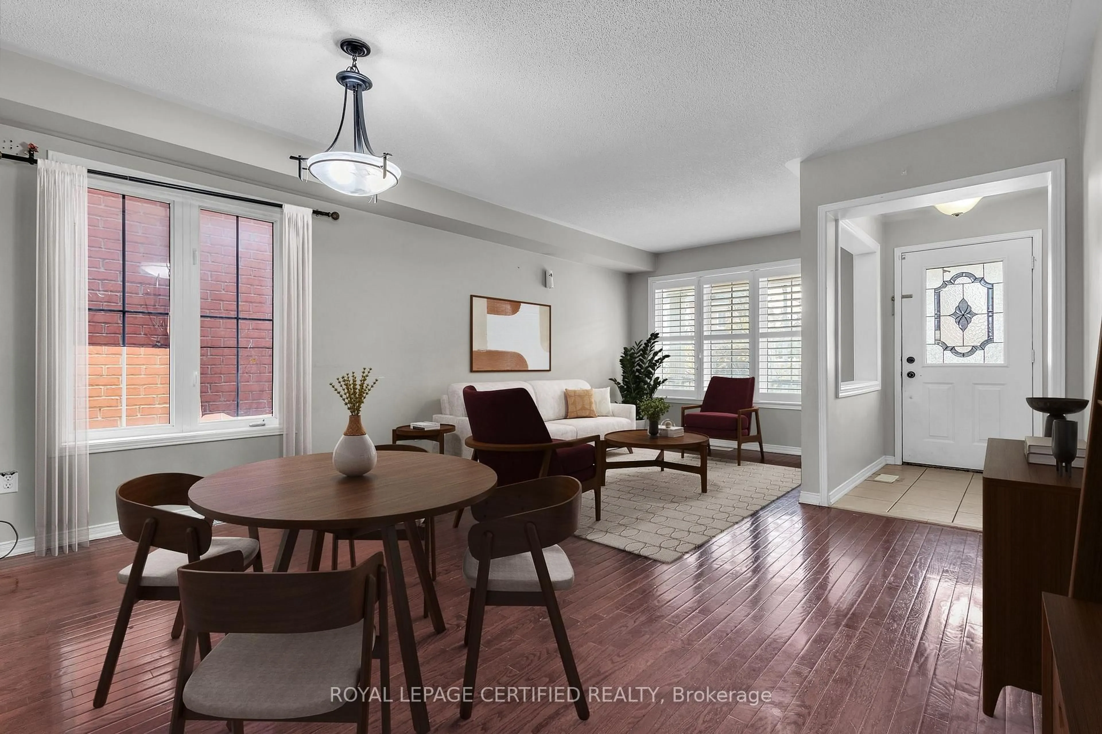 Living room with furniture, wood/laminate floor for 3 Tansley Cres, Ajax Ontario L1Z 1Y5