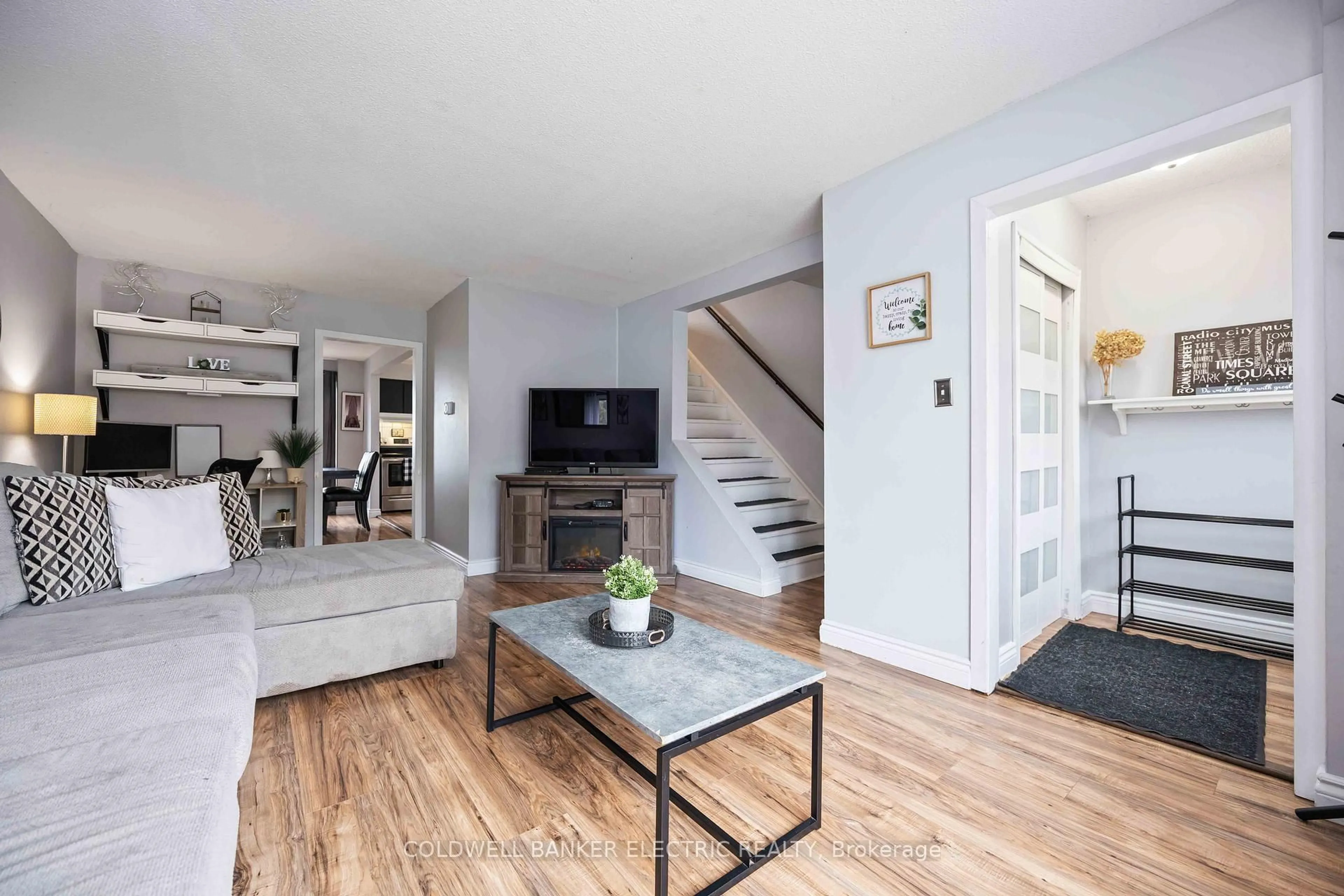 Living room with furniture, wood/laminate floor for 900 Southridge St, Oshawa Ontario L1H 8A5