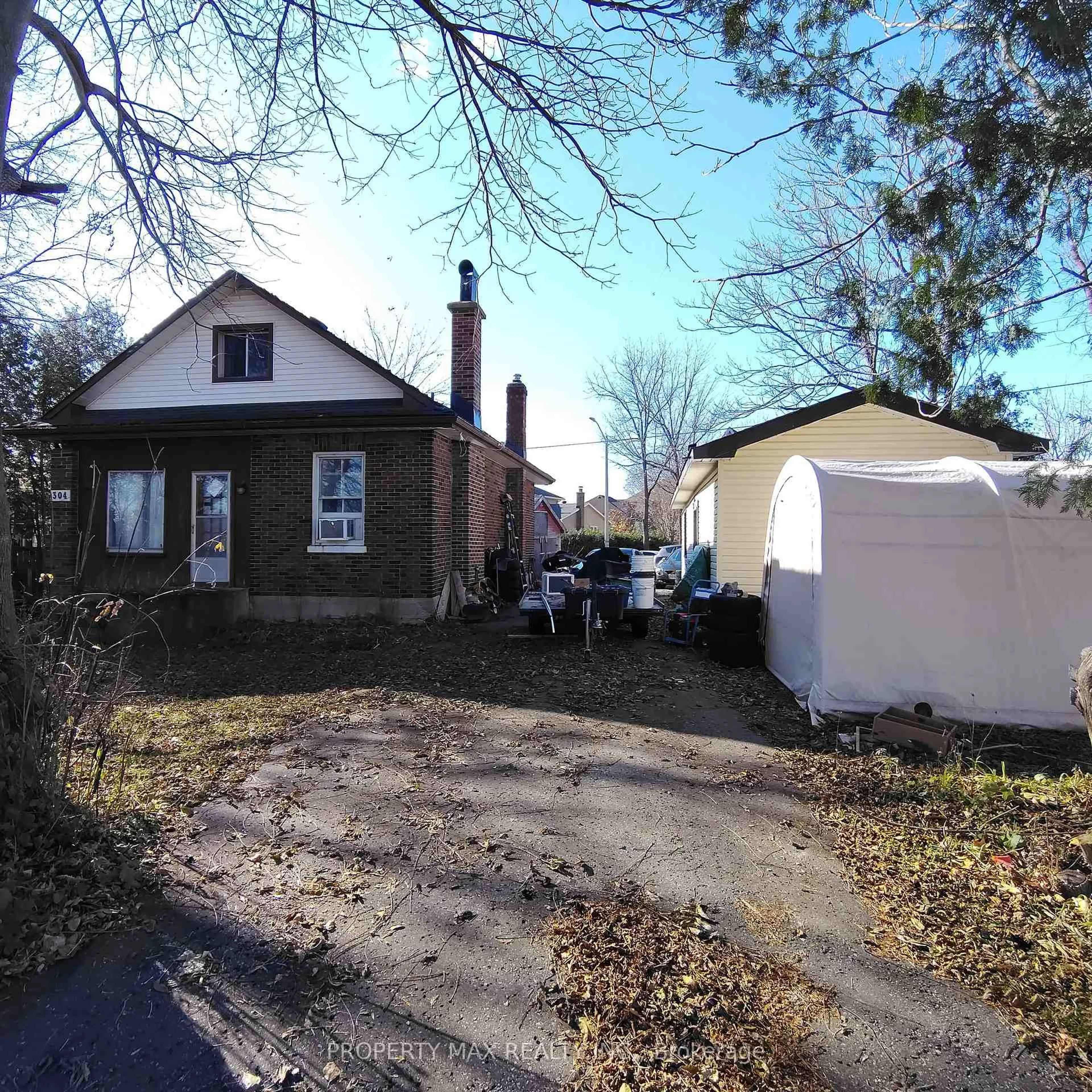 A pic from outside/outdoor area/front of a property/back of a property/a pic from drone, street for 304 West Scugog Lane, Clarington Ontario L1C 3K2