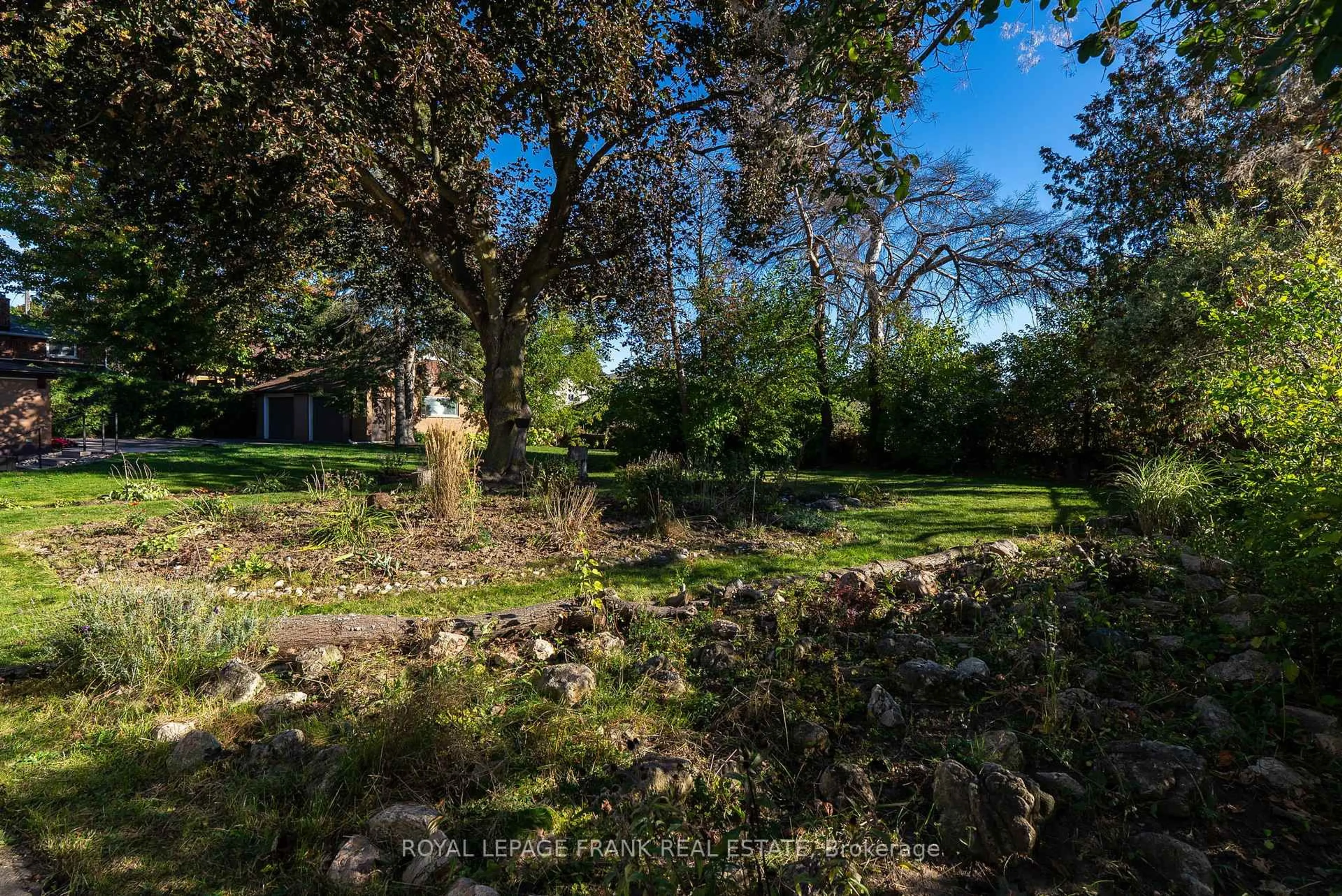 A pic from outside/outdoor area/front of a property/back of a property/a pic from drone, forest/trees view for 1033 King St, Oshawa Ontario L1H 1H4