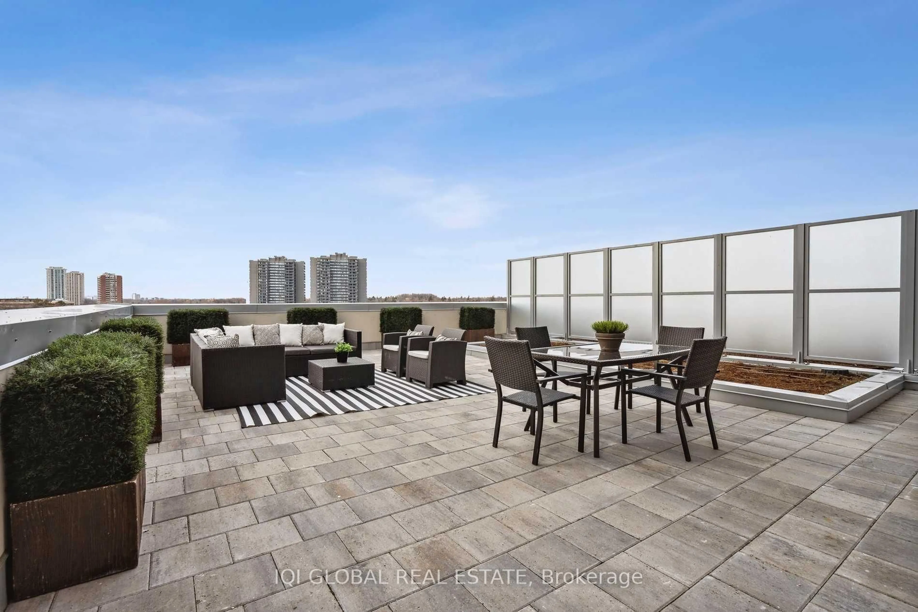 Patio, city buildings view from balcony for 225 Village Green Sq #1709, Toronto Ontario M1S 0L3