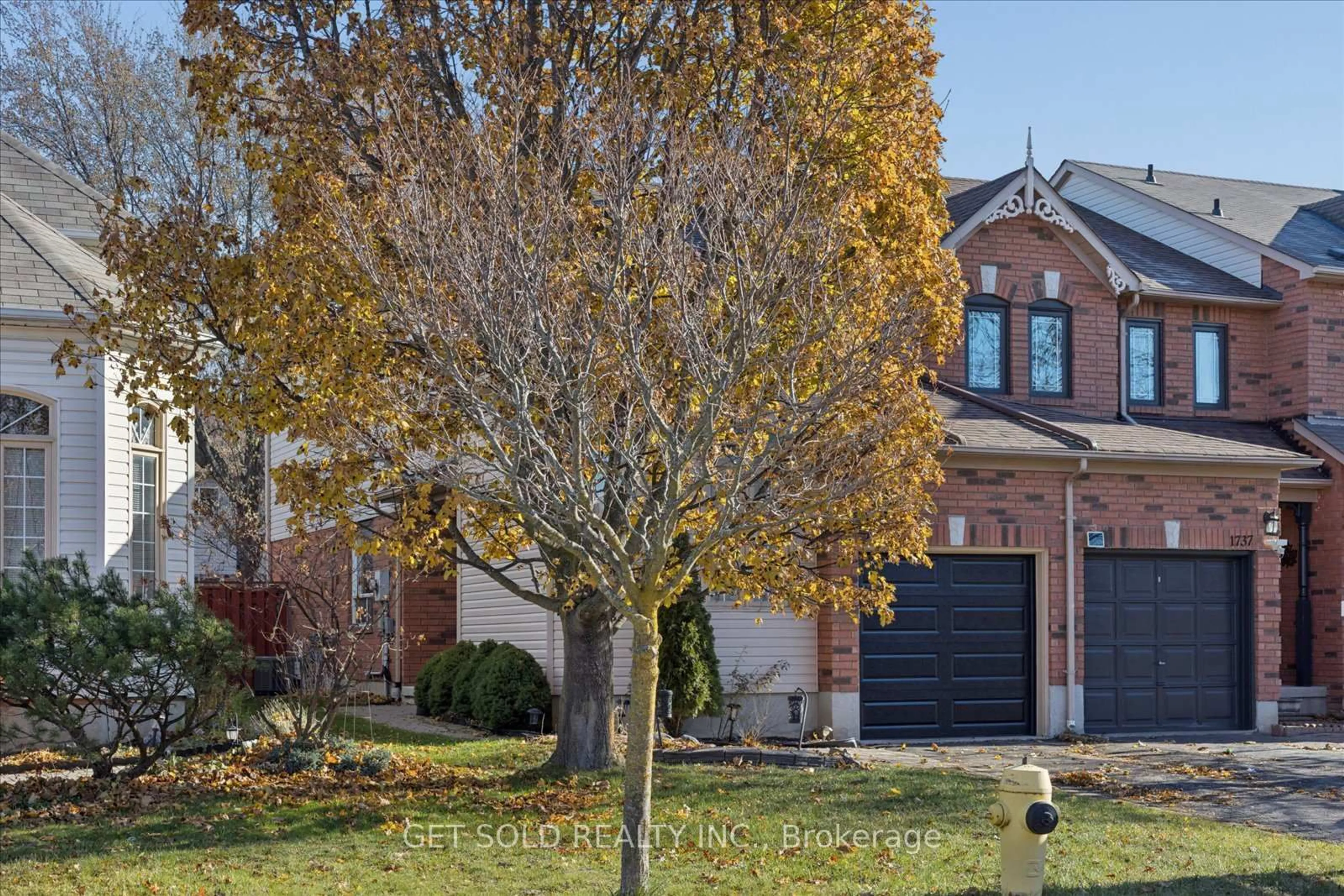 Home with brick exterior material, street for 1739 Woodgate Tr, Oshawa Ontario L1G 8B4