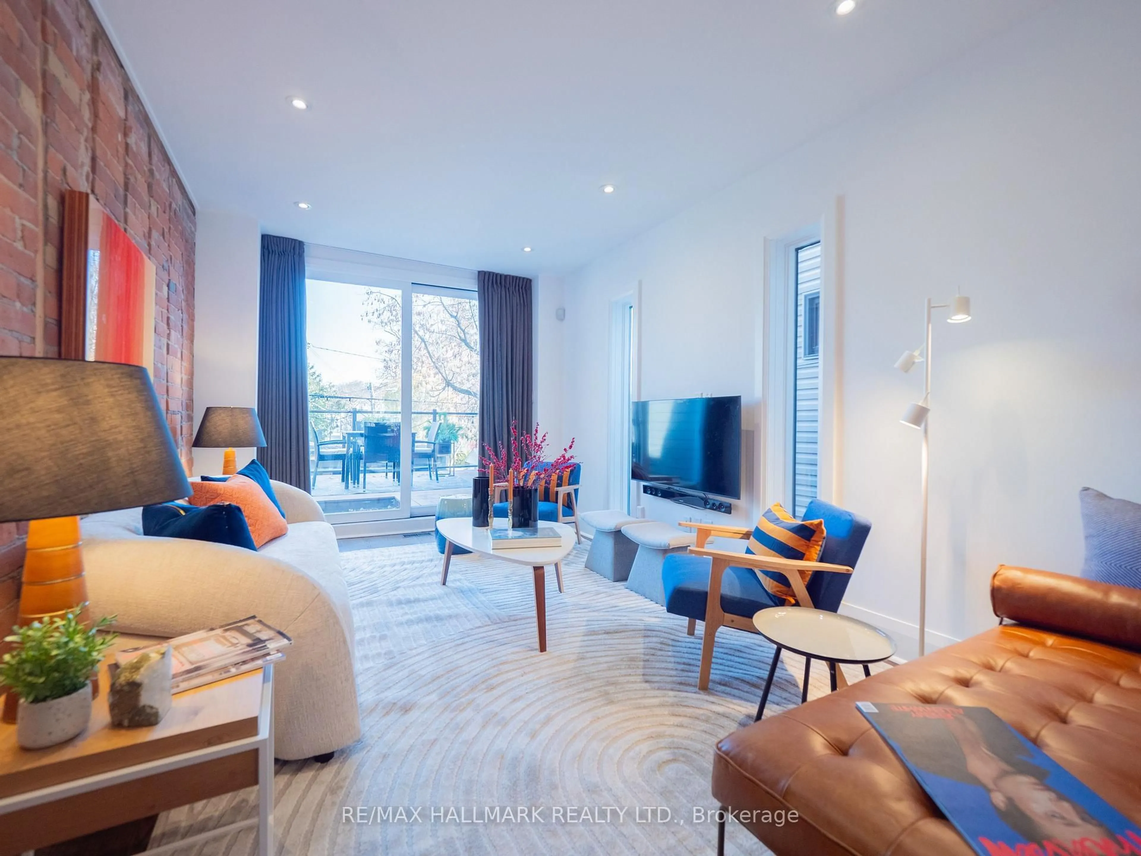 Living room with furniture, unknown for 559 Logan Ave, Toronto Ontario M4K 3B6