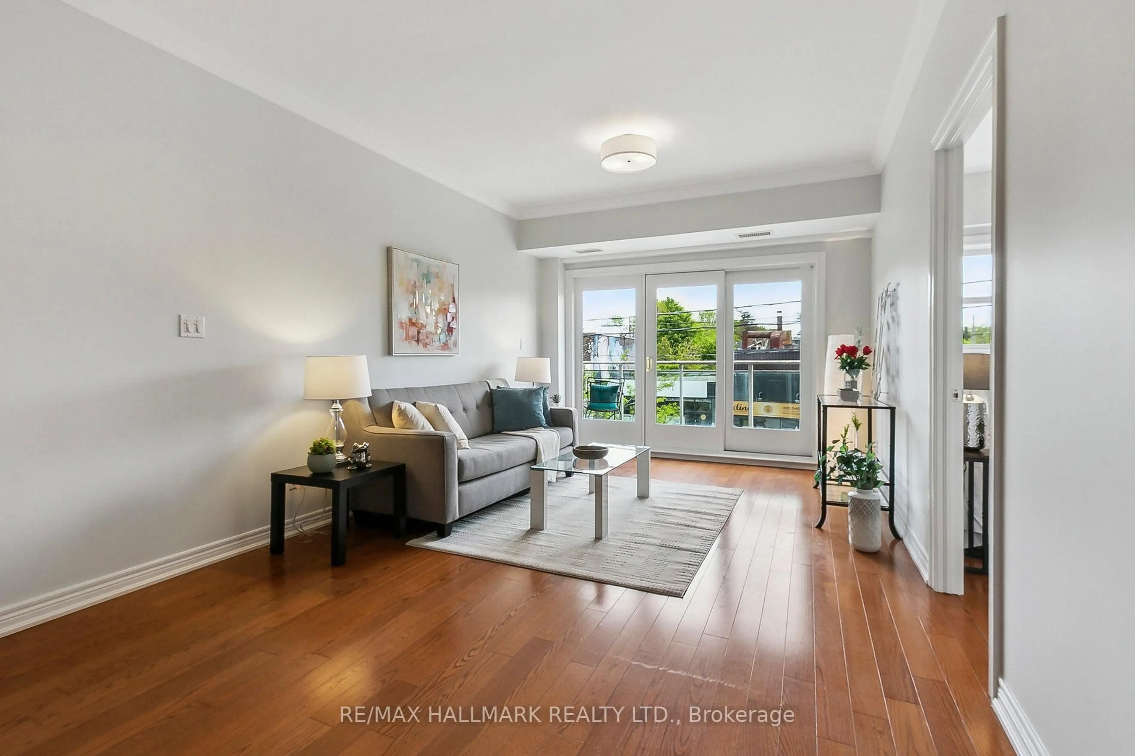 Living room with furniture, unknown for 1 Lawlor Ave #206, Toronto Ontario M4E 3L8