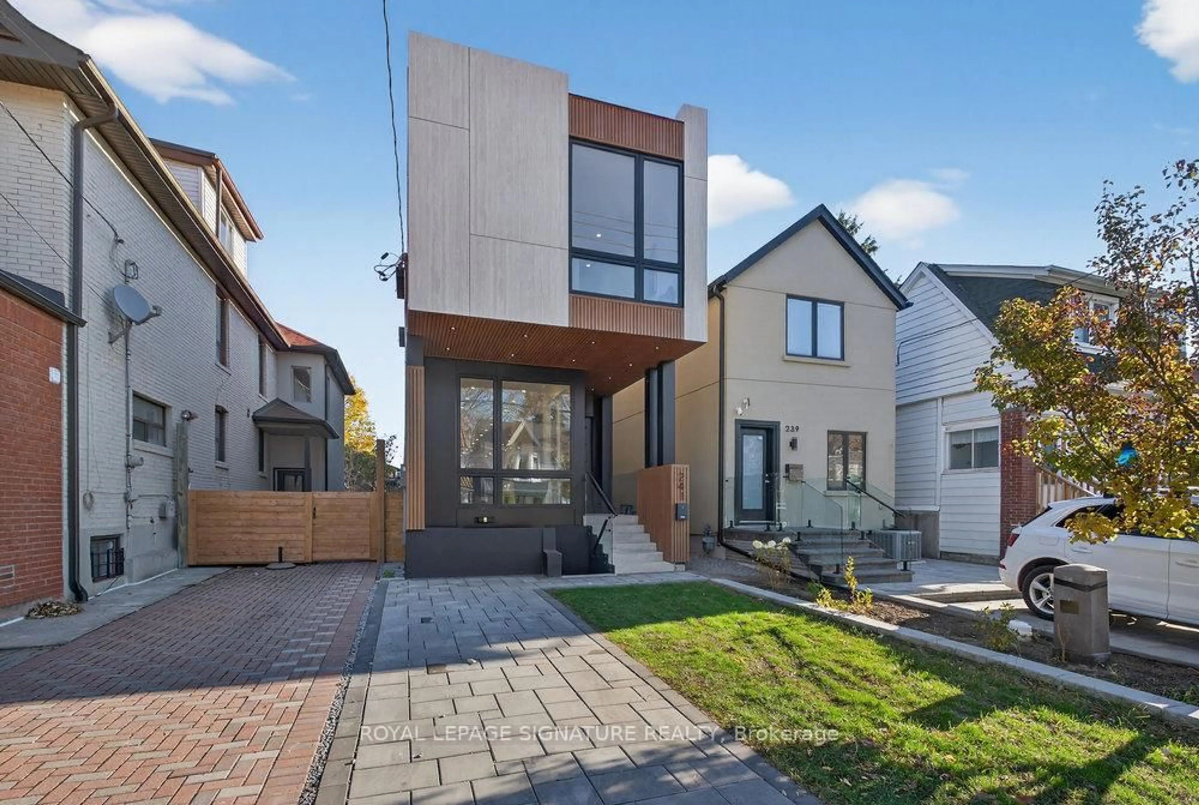 Home with brick exterior material, street for 241 Cedarvale Ave, Toronto Ontario M4C 4K3