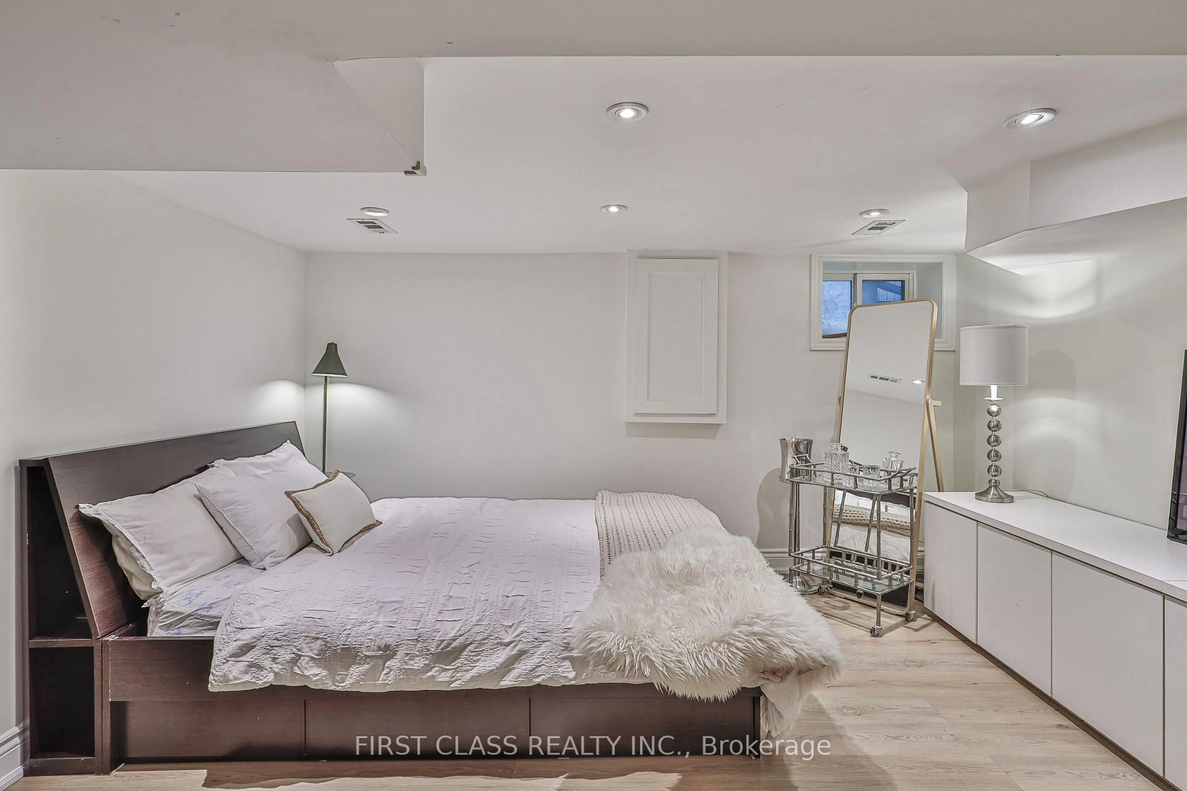 Bedroom with bed, unknown for 14 Herbert Ave, Toronto Ontario M4L 3P9