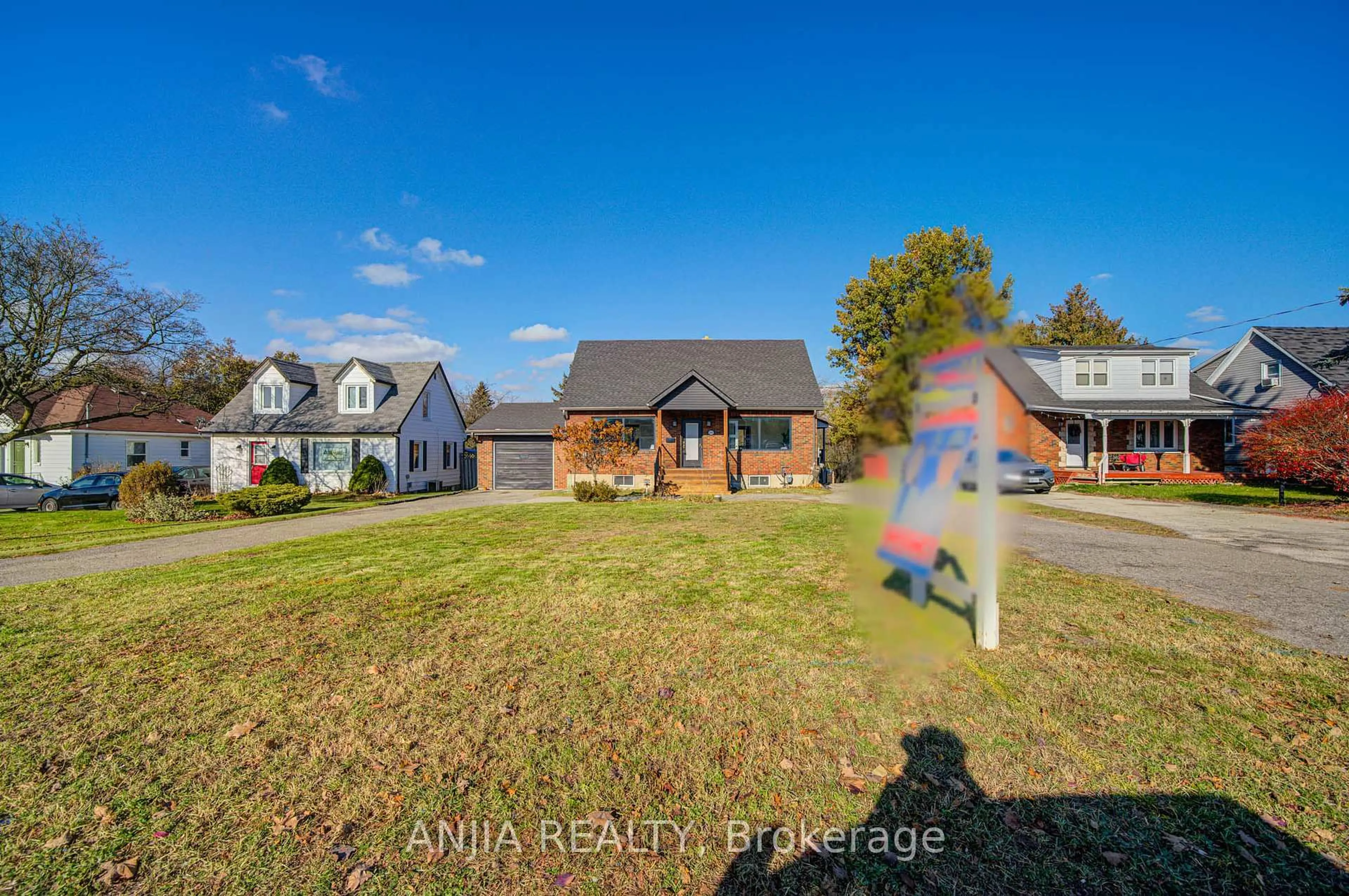 A pic from outside/outdoor area/front of a property/back of a property/a pic from drone, street for 1574 Hwy 2 Rd, Clarington Ontario L1E 2R7