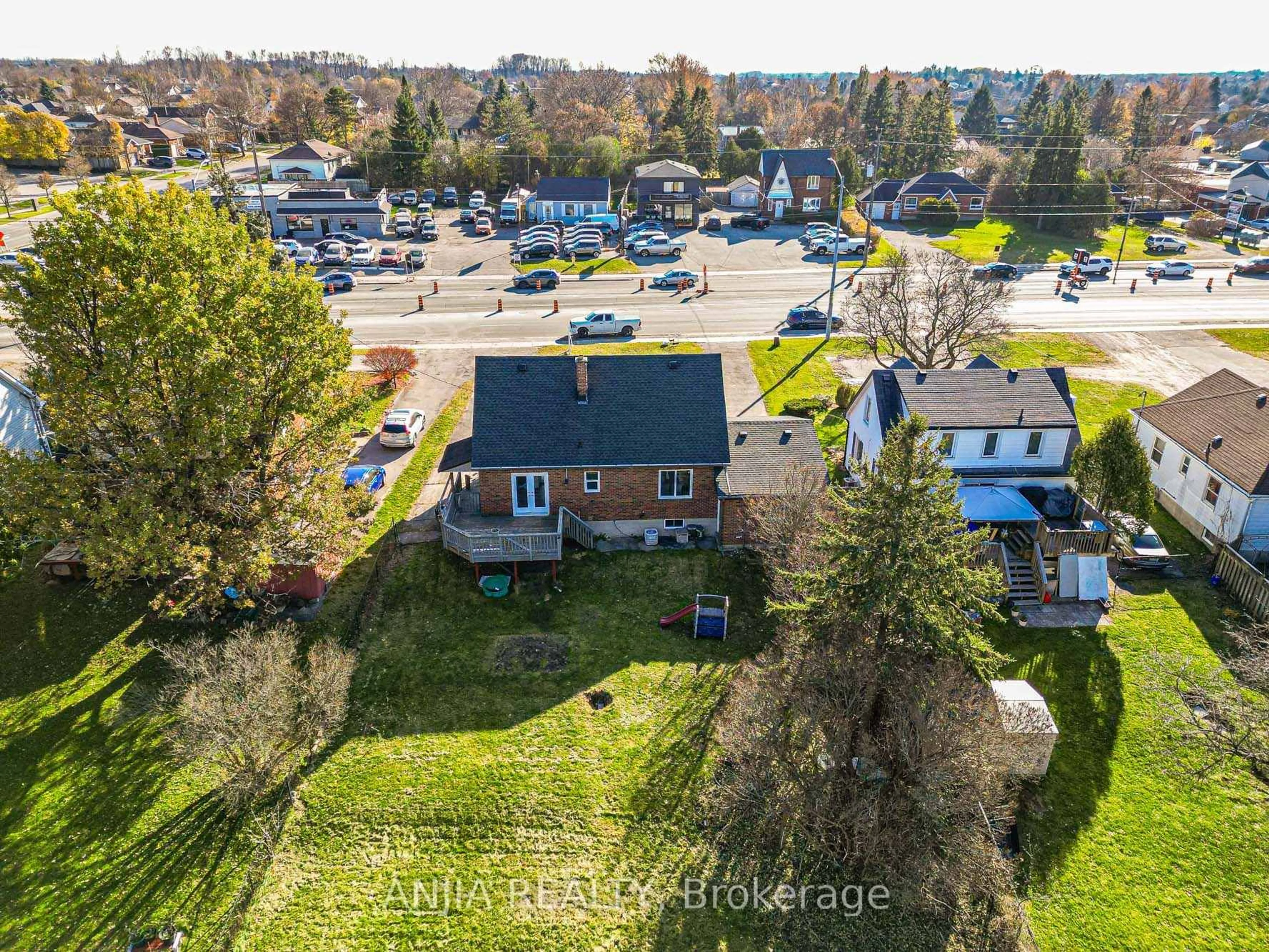 A pic from outside/outdoor area/front of a property/back of a property/a pic from drone, street for 1574 Hwy 2 Rd, Clarington Ontario L1E 2R7